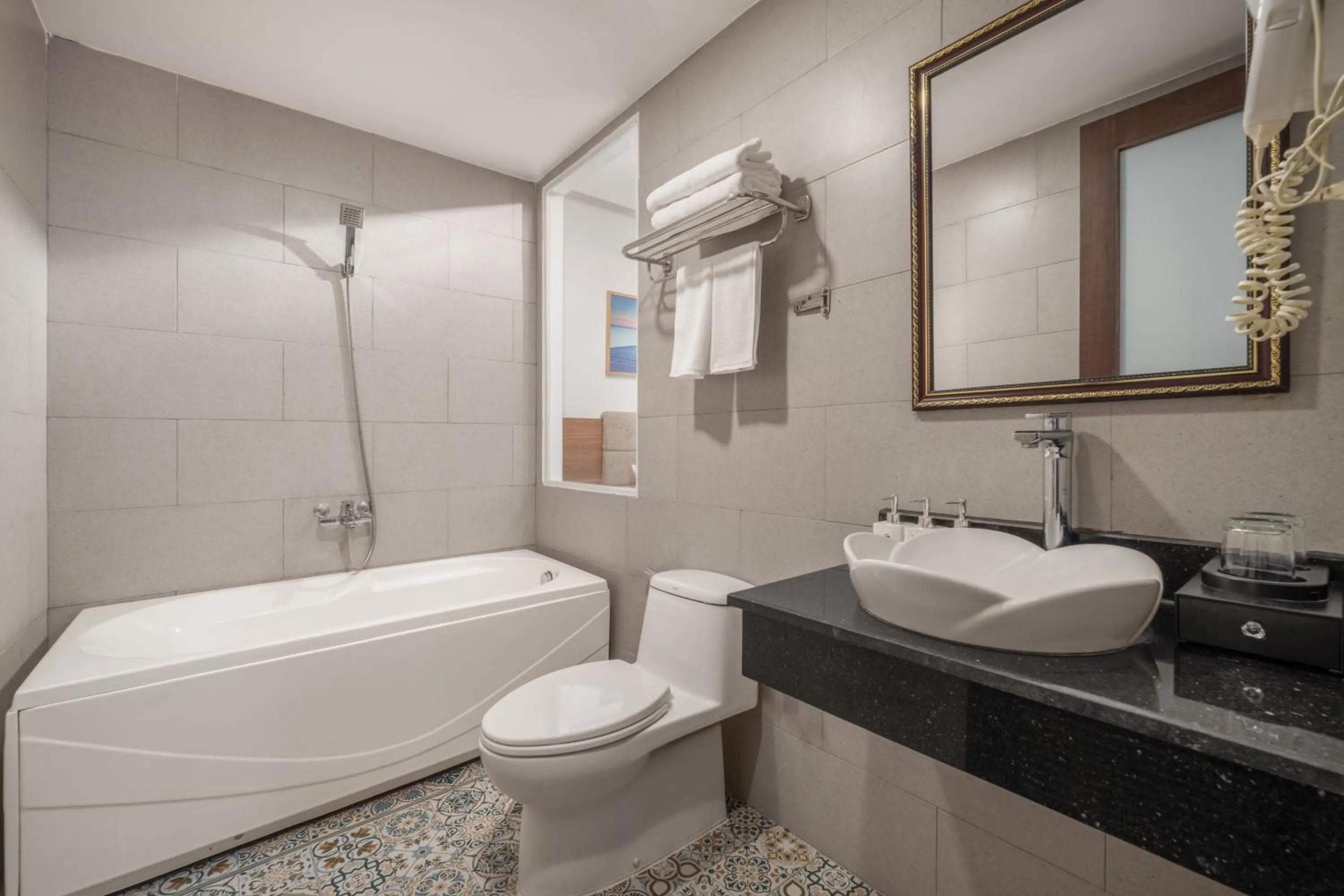 Shower in Platinum Orchid Hotel Danang