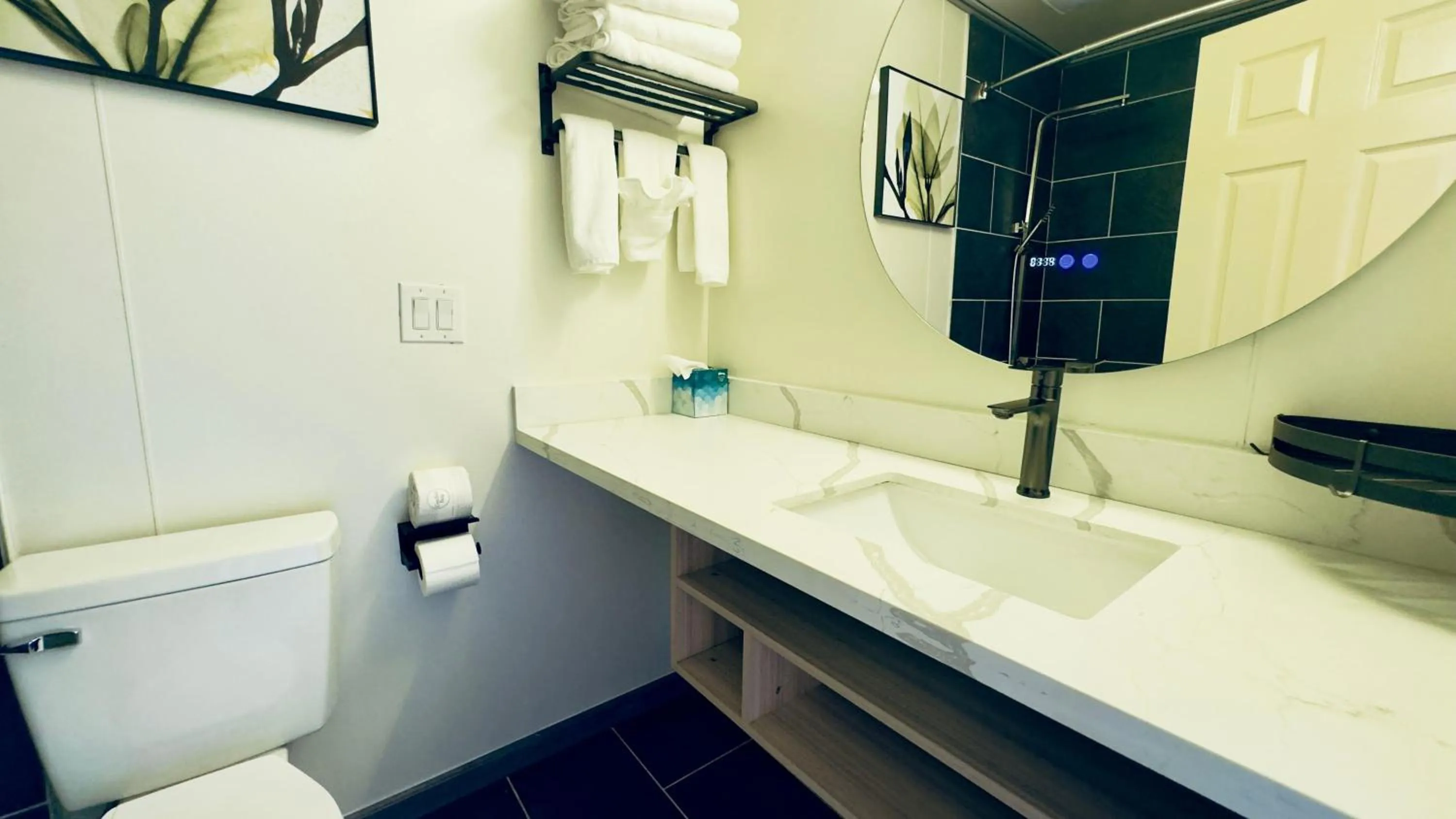 Bathroom in Interurban Suites Hotel, a Dazzler Select by Wyndham