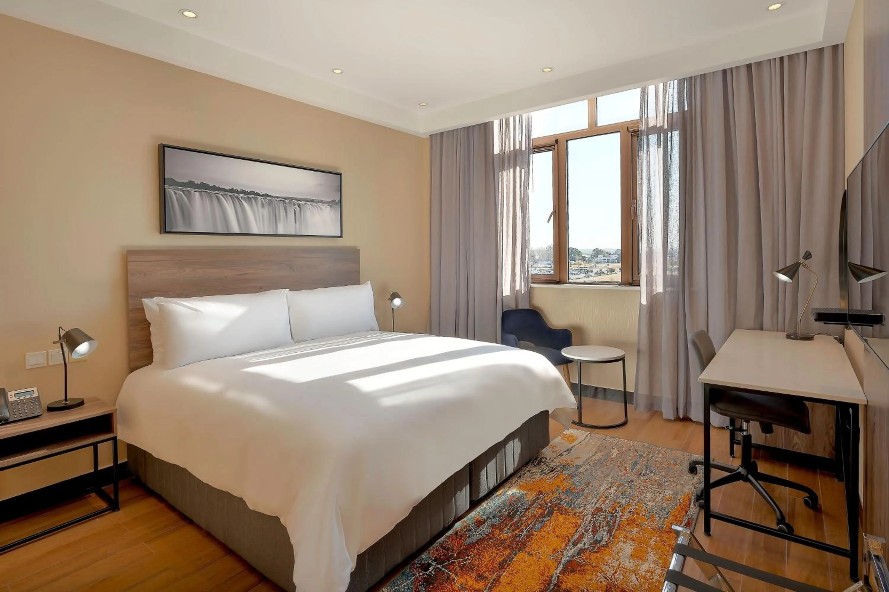 Photo of the whole room, Bed in Protea Hotel by Marriott Lusaka International Airport