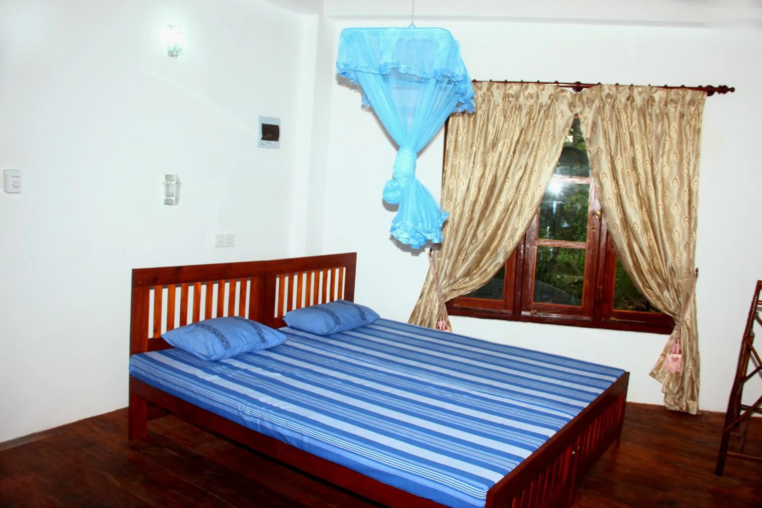 Bedroom, Bed in Seasons Four Mini Jungle Cabana