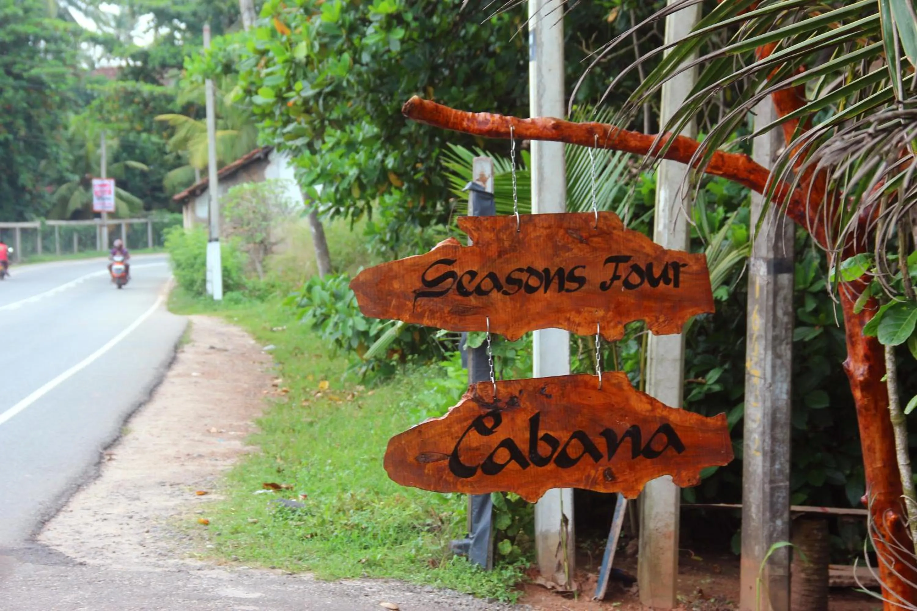 Property logo or sign in Seasons Four Mini Jungle Cabana