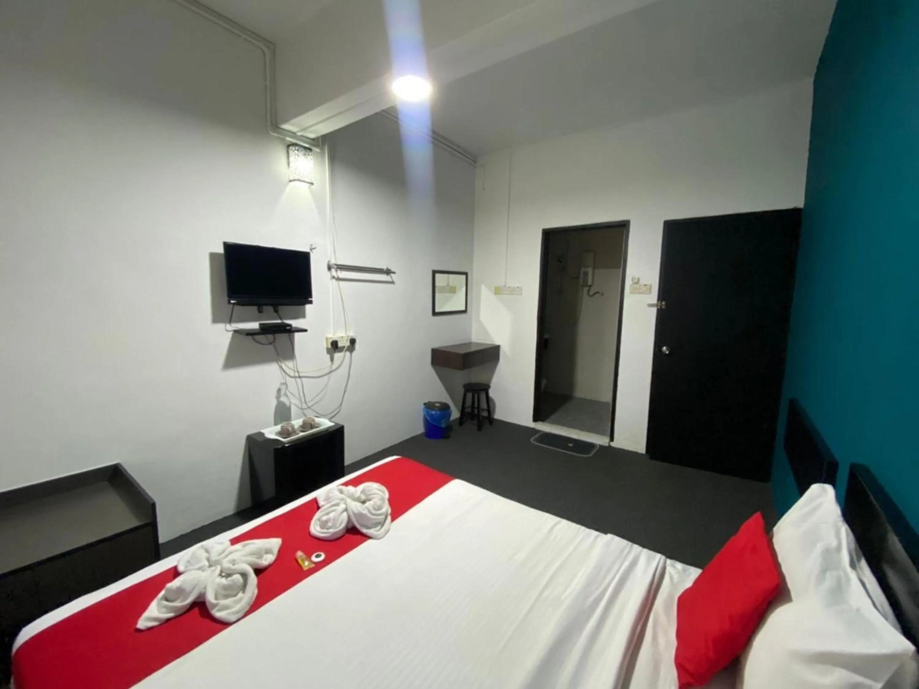 Bedroom in Hotel O Captain Hotel Cafe & Bistro