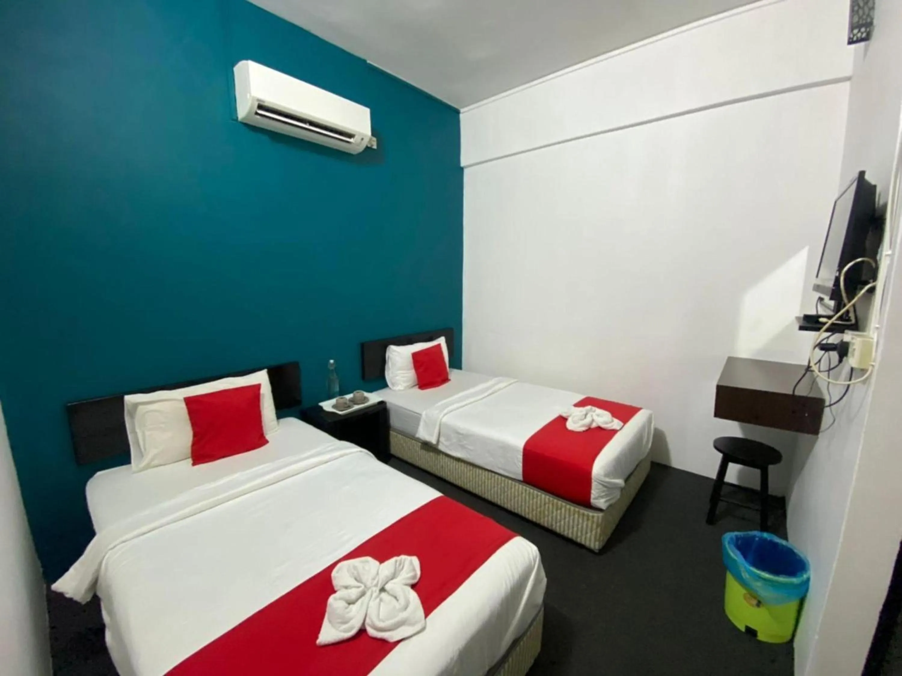 Bedroom in Hotel O Captain Hotel Cafe & Bistro