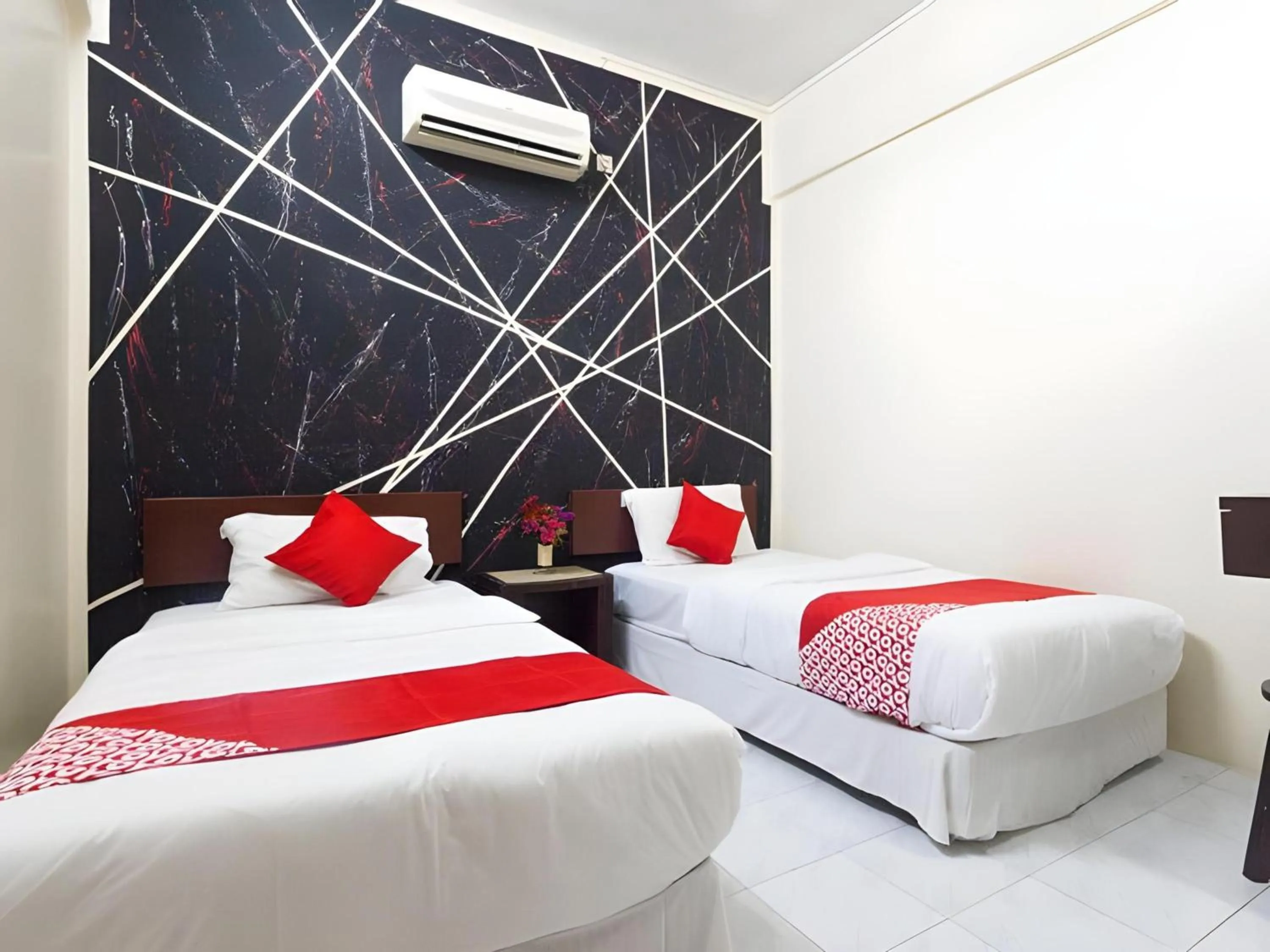 Bedroom in Hotel O Captain Hotel Cafe & Bistro