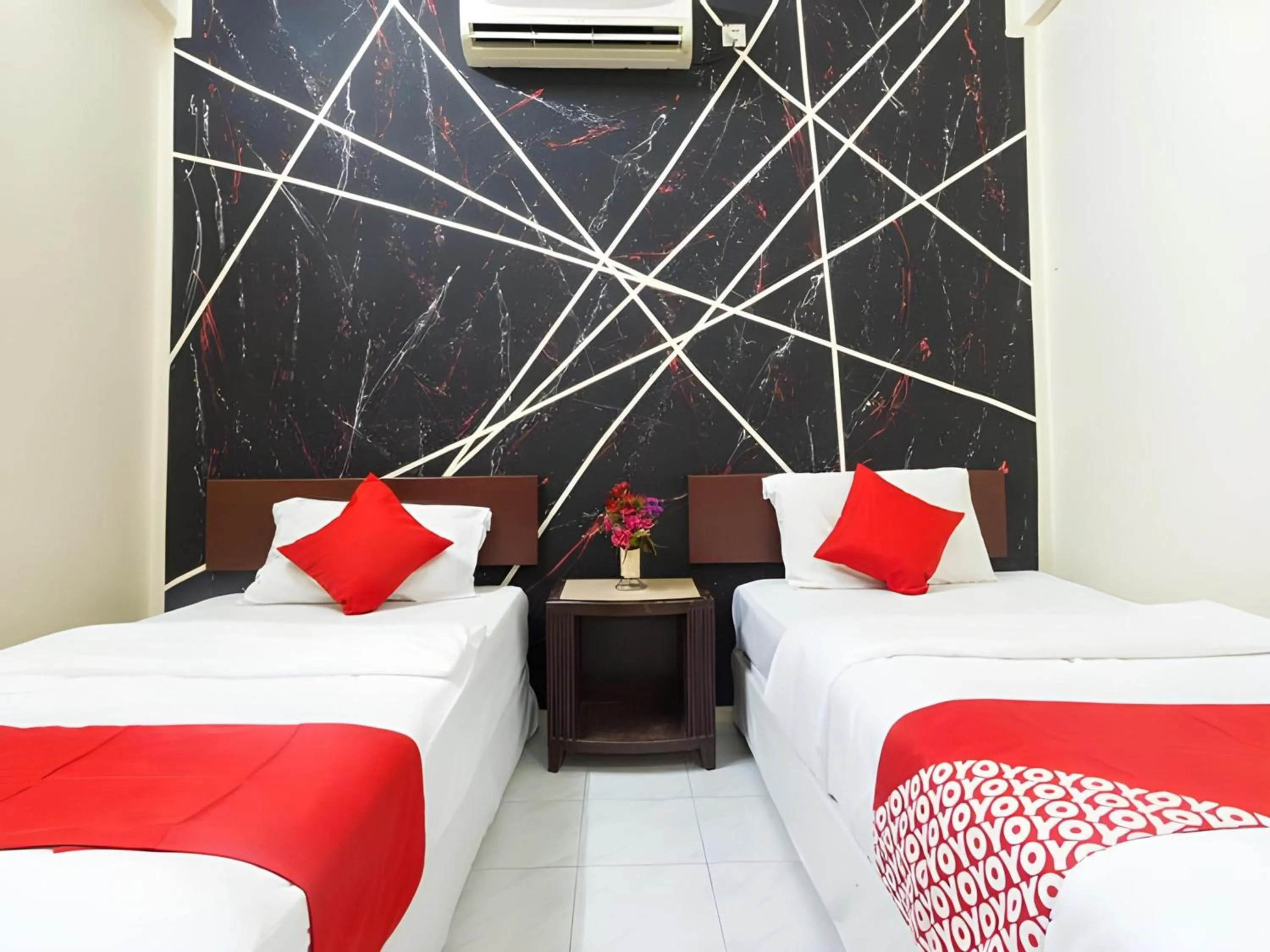 Bedroom in Hotel O Captain Hotel Cafe & Bistro