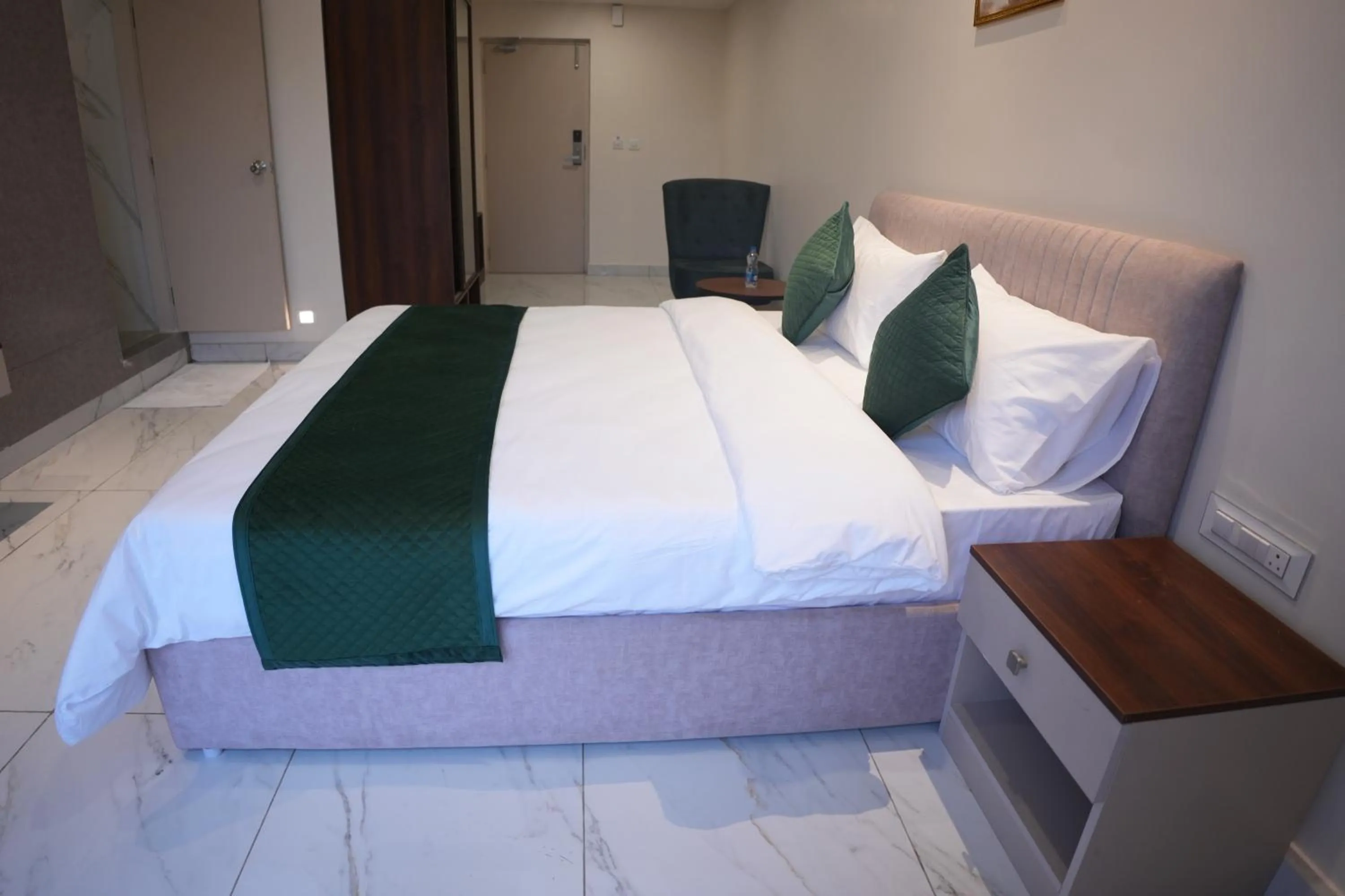 Bed in AK Castle Suites