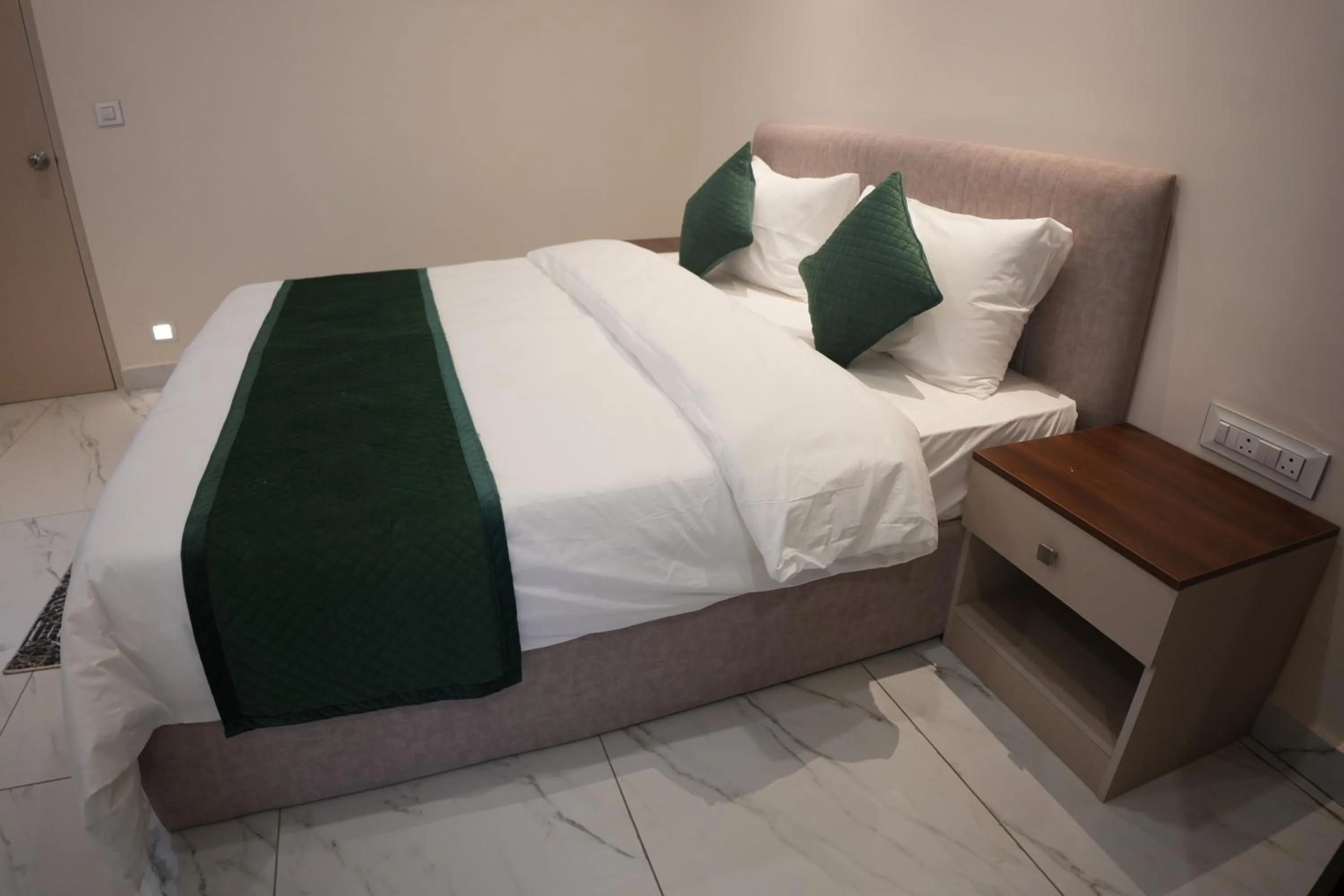 Bed in AK Castle Suites