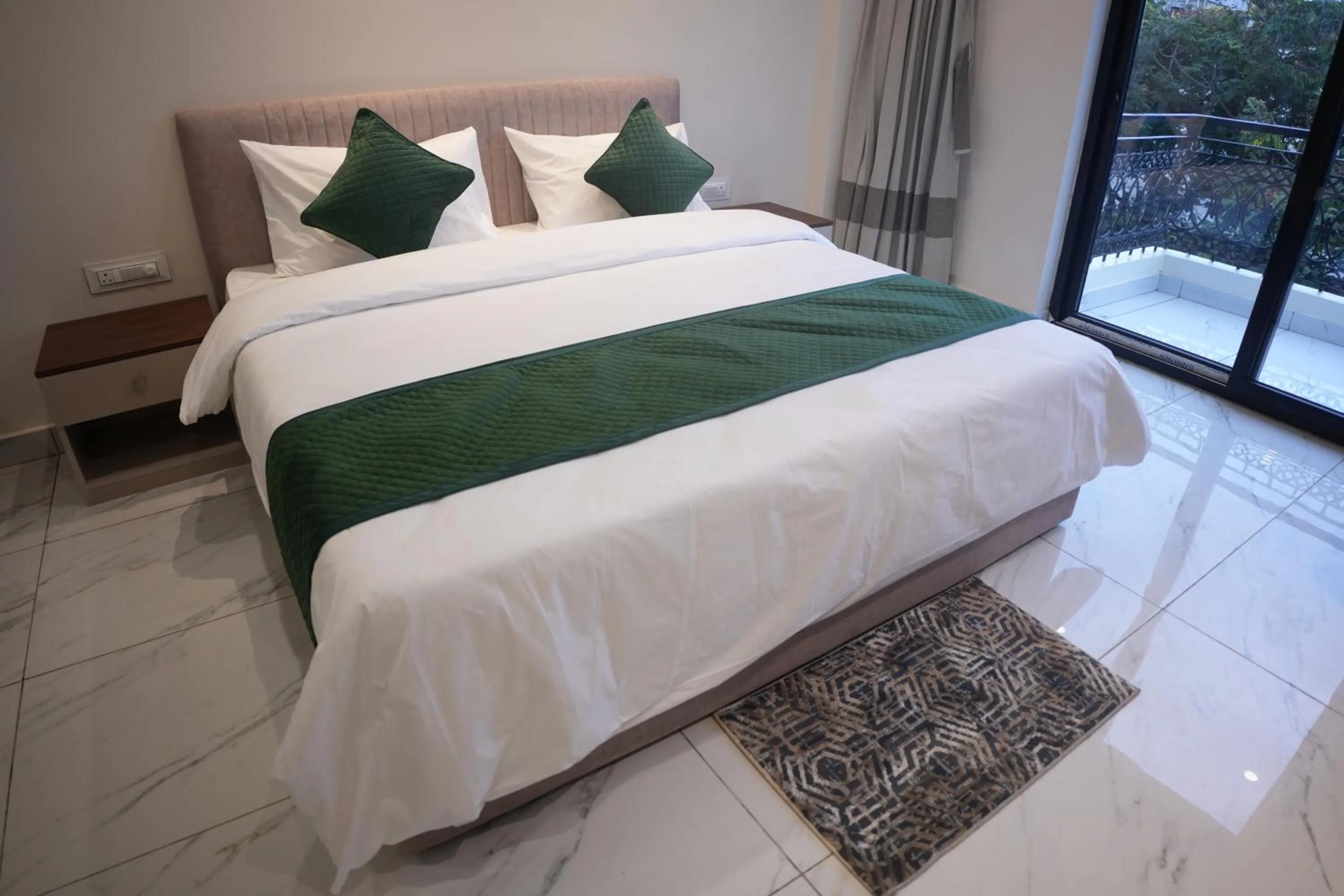 Bed in AK Castle Suites