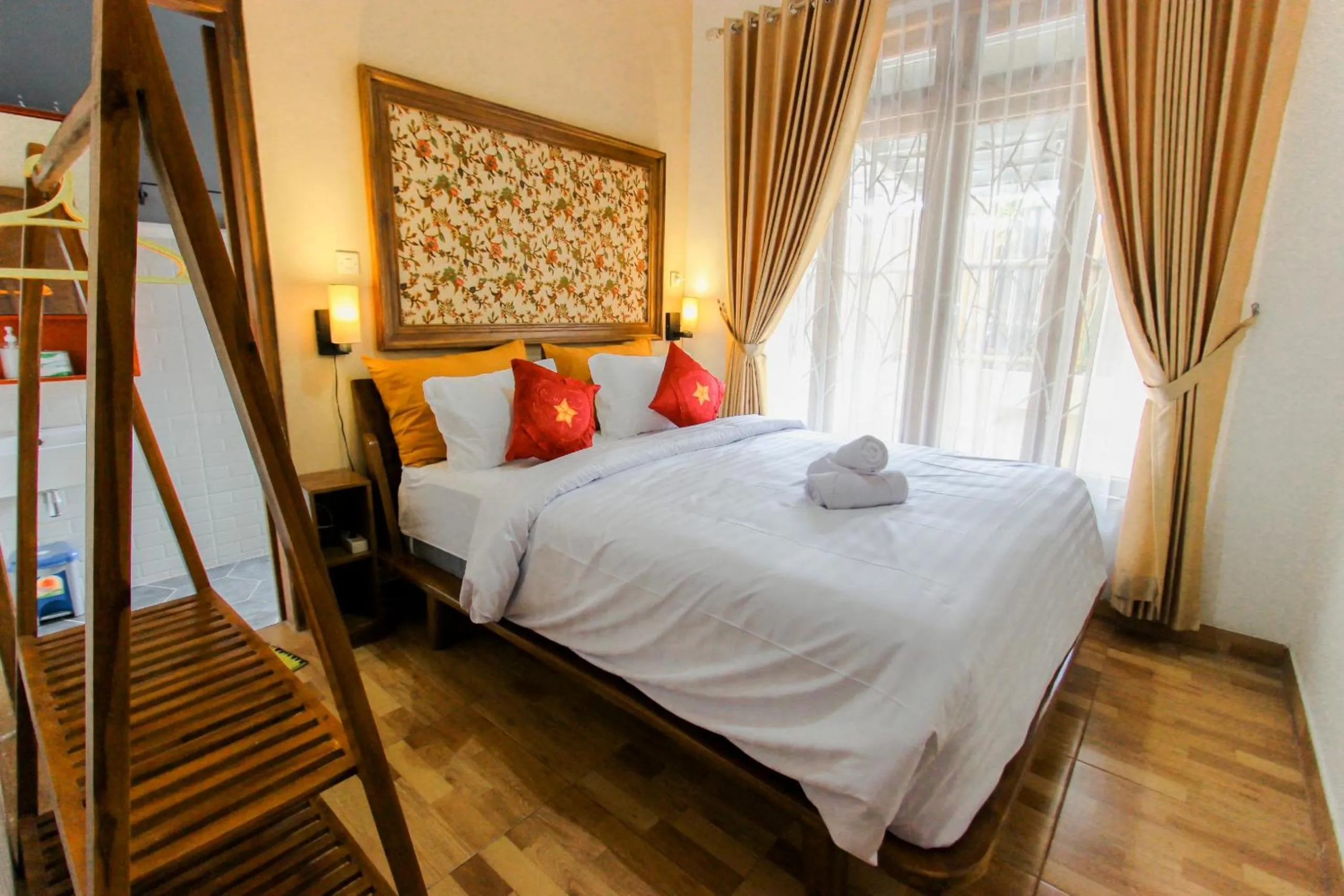 Bed in Villa D'Maguwo Suites