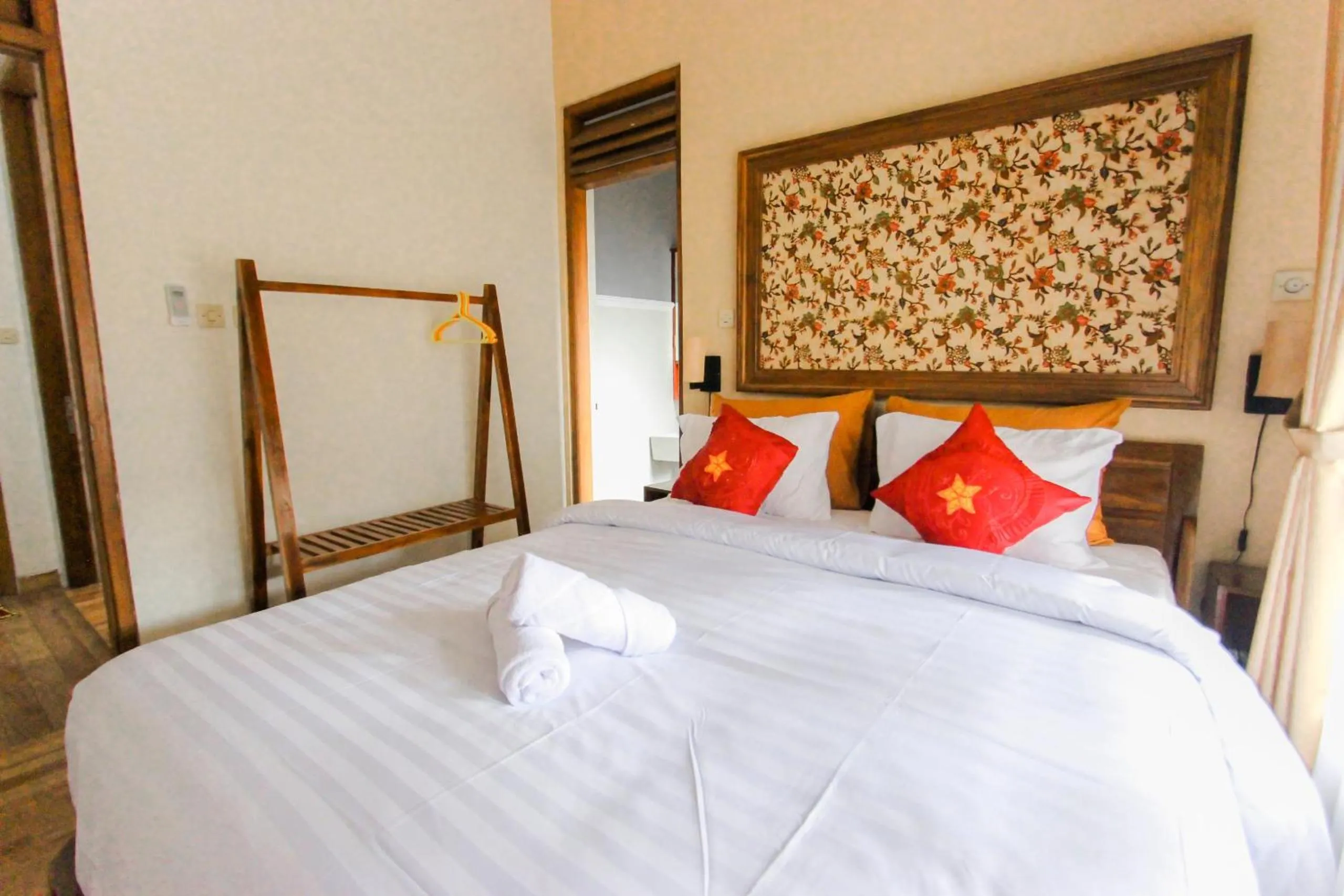 Bed in Villa D'Maguwo Suites