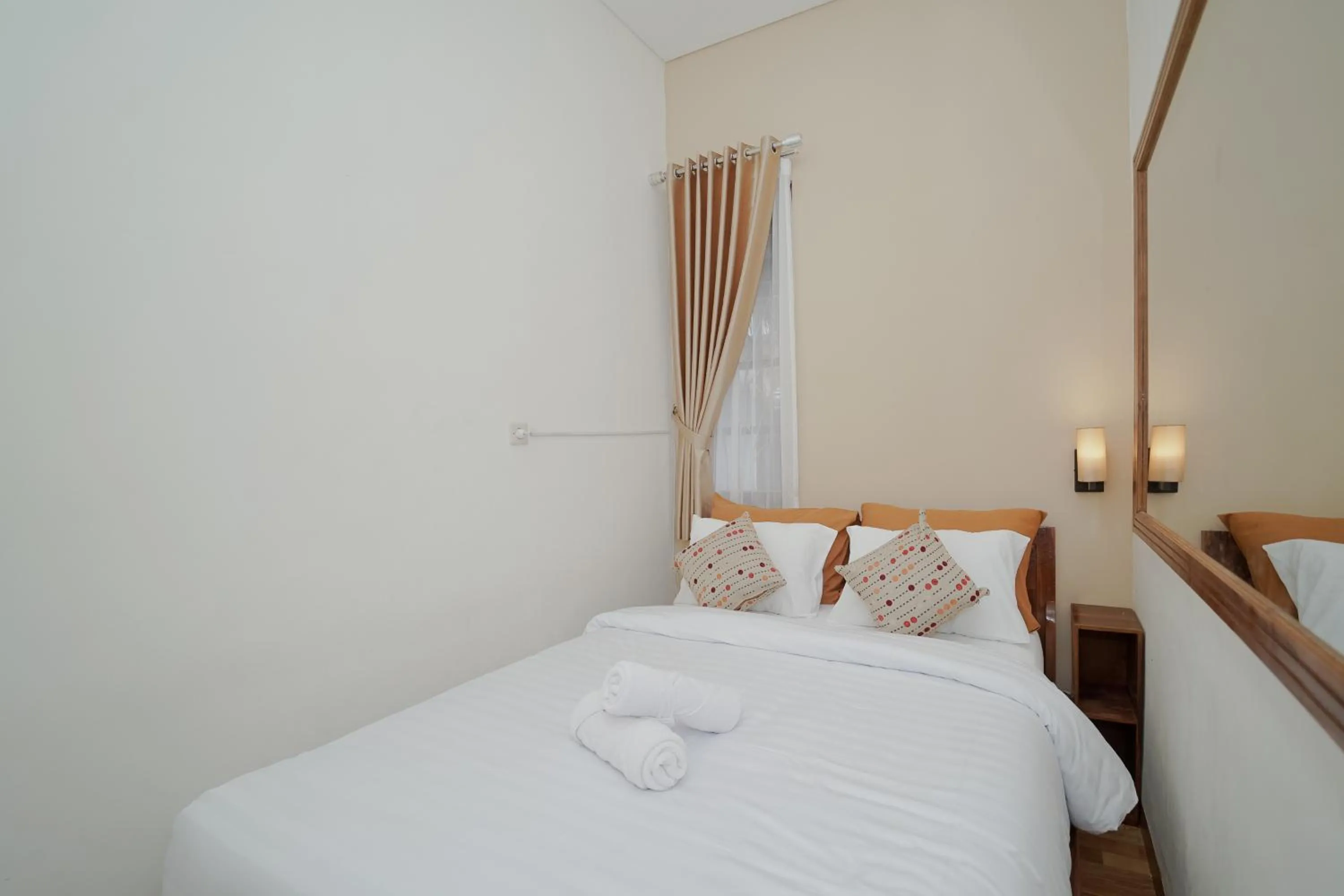 Bed in Villa D'Maguwo Suites