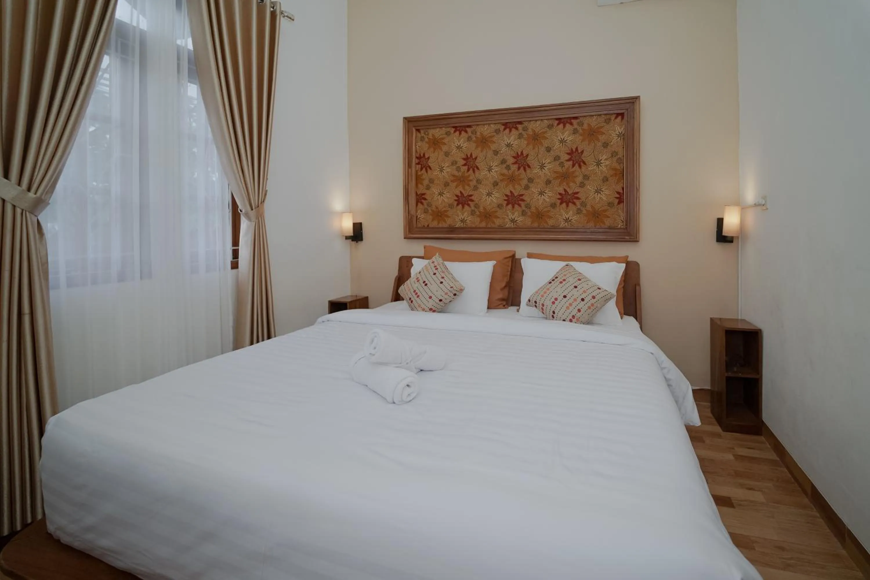 Bed in Villa D'Maguwo Suites