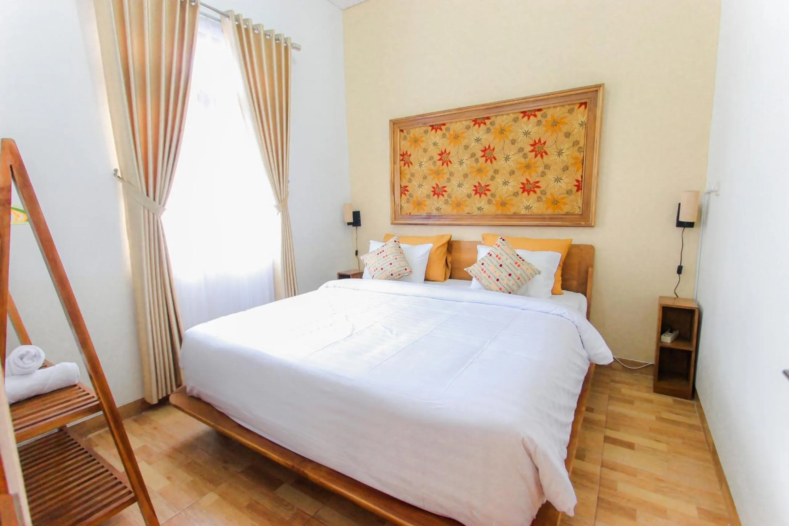 Bed in Villa D'Maguwo Suites