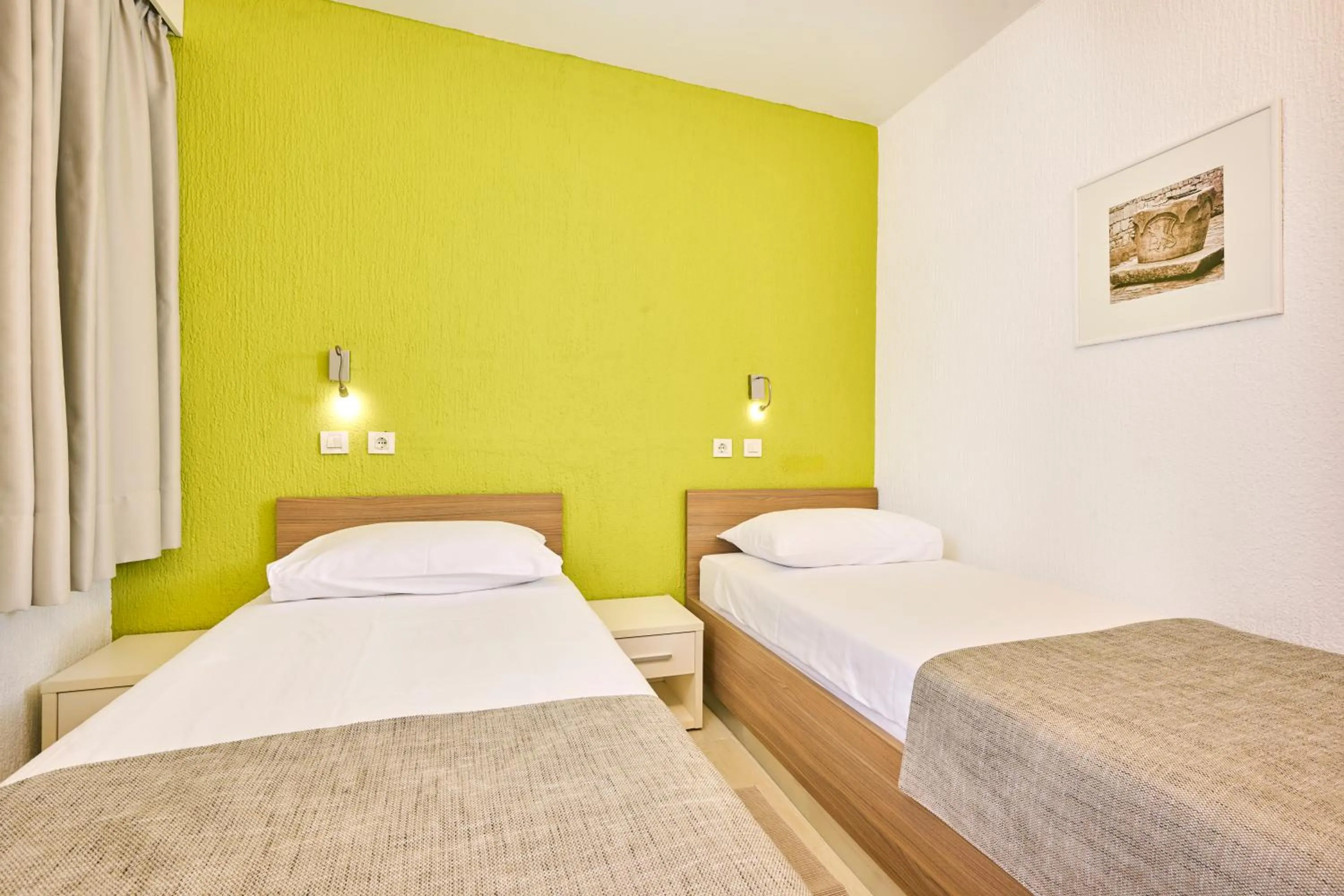 Bed in Apartments Galijot Plava Laguna