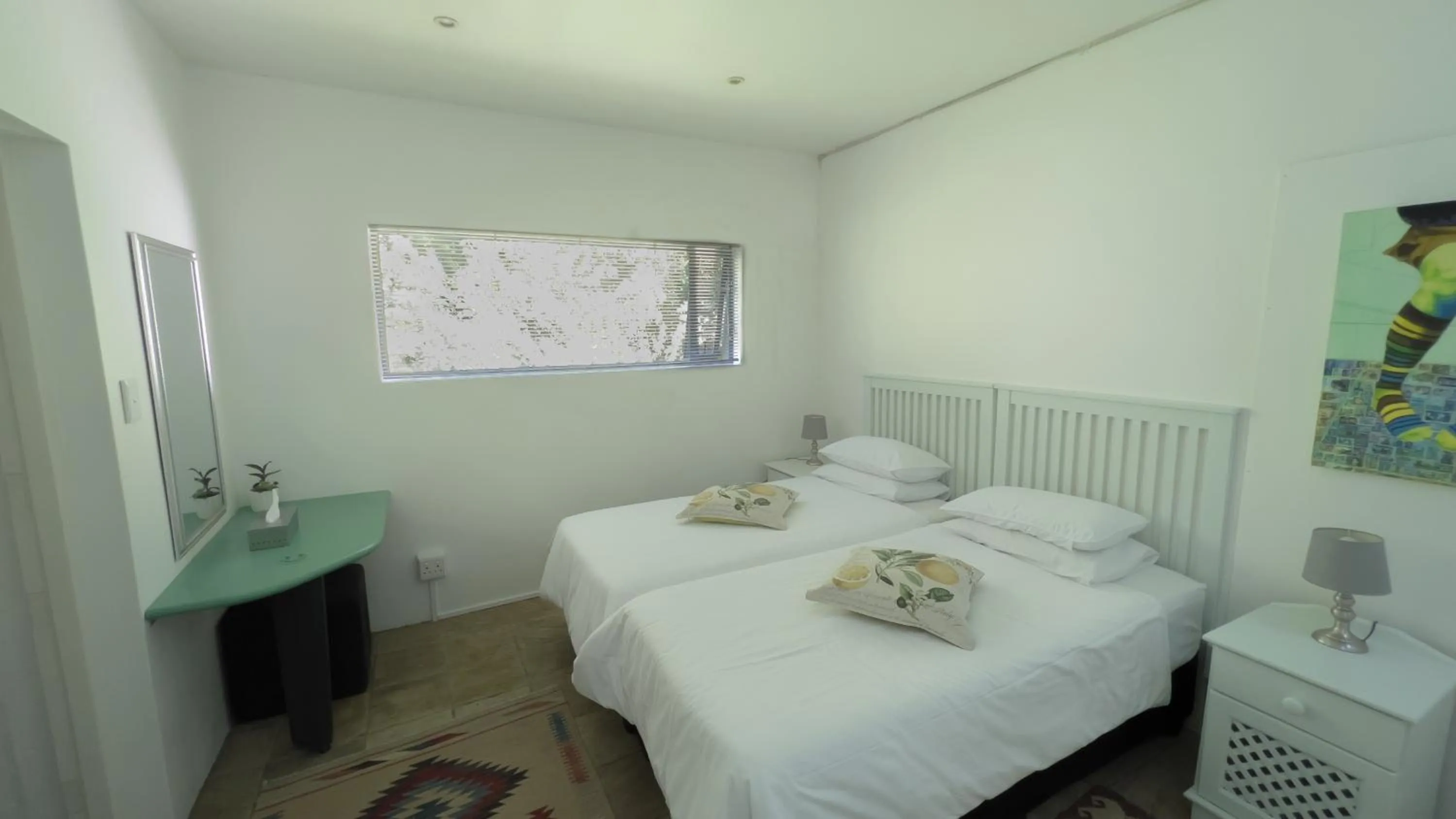 Bed in Orangerie Guest House