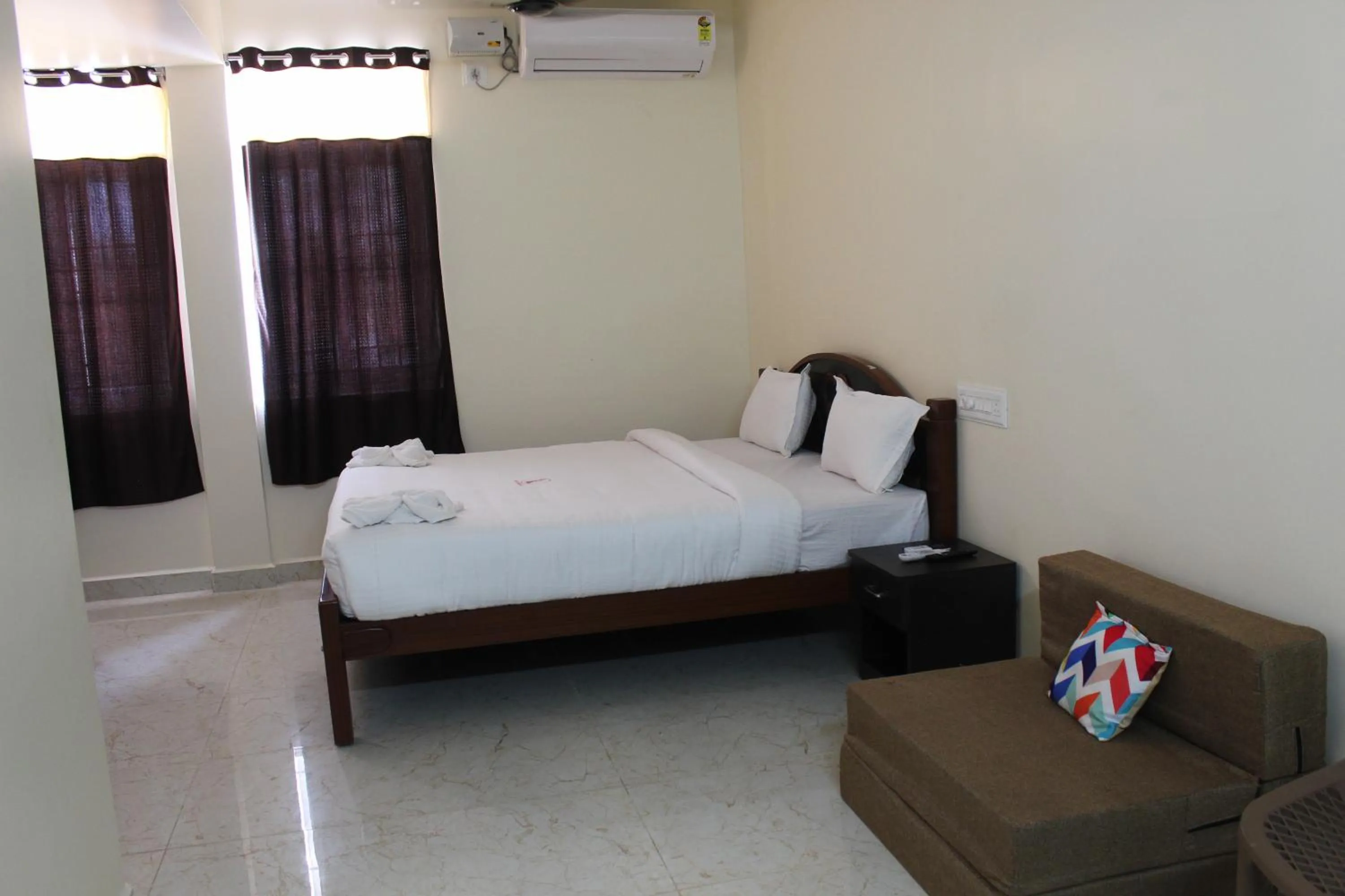 Bed in Kumaran Residency