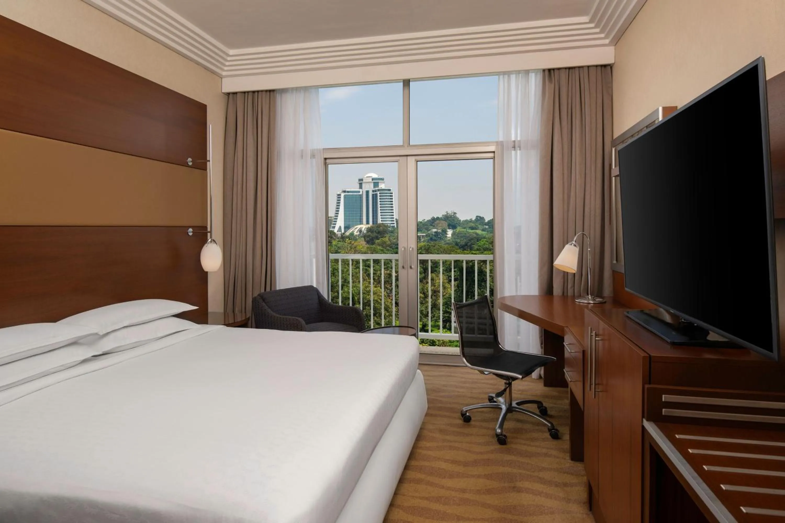 Photo of the whole room, Bed in Sheraton Kampala Hotel