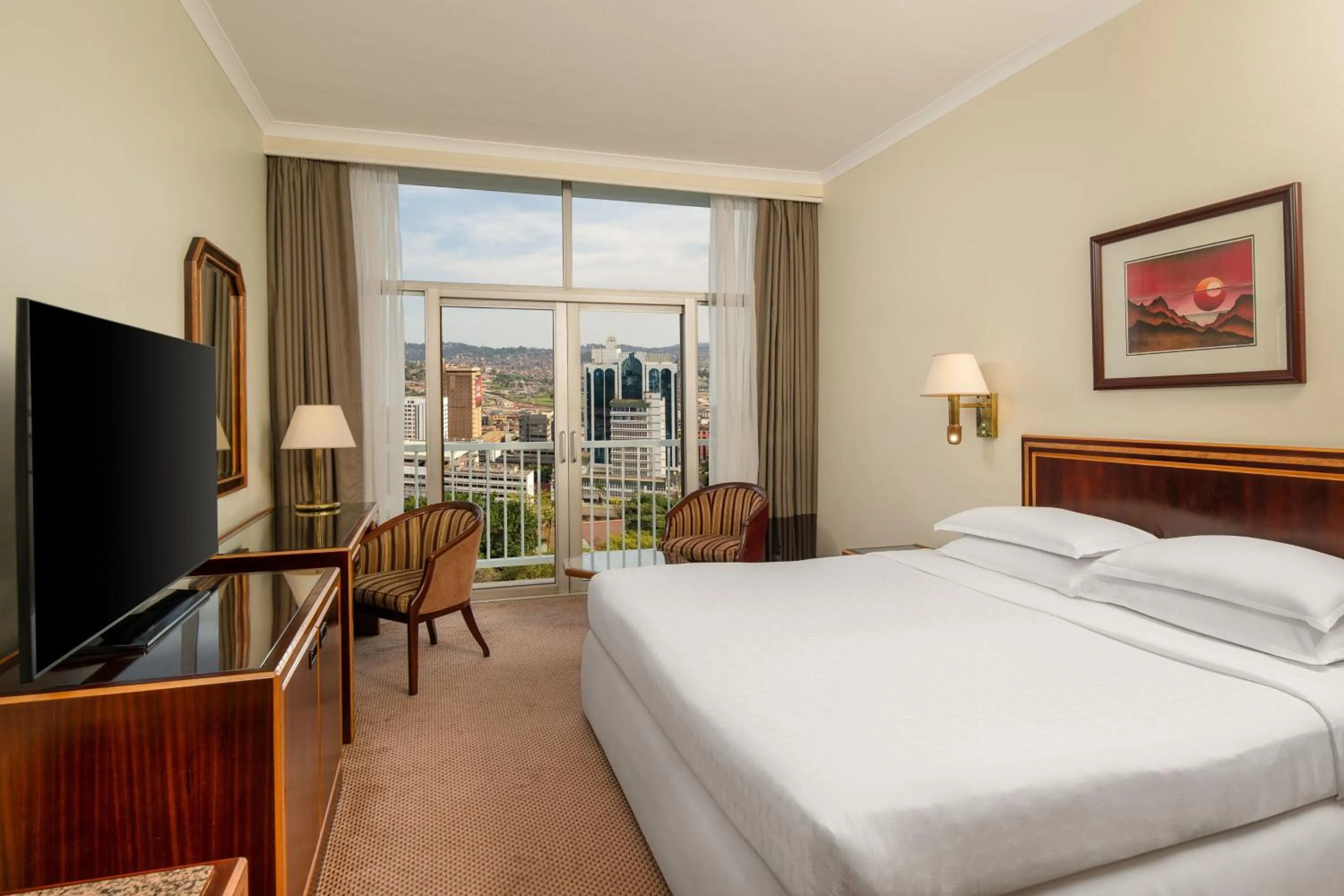 Photo of the whole room, Bed in Sheraton Kampala Hotel