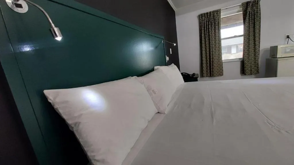 Bed in Village Motel