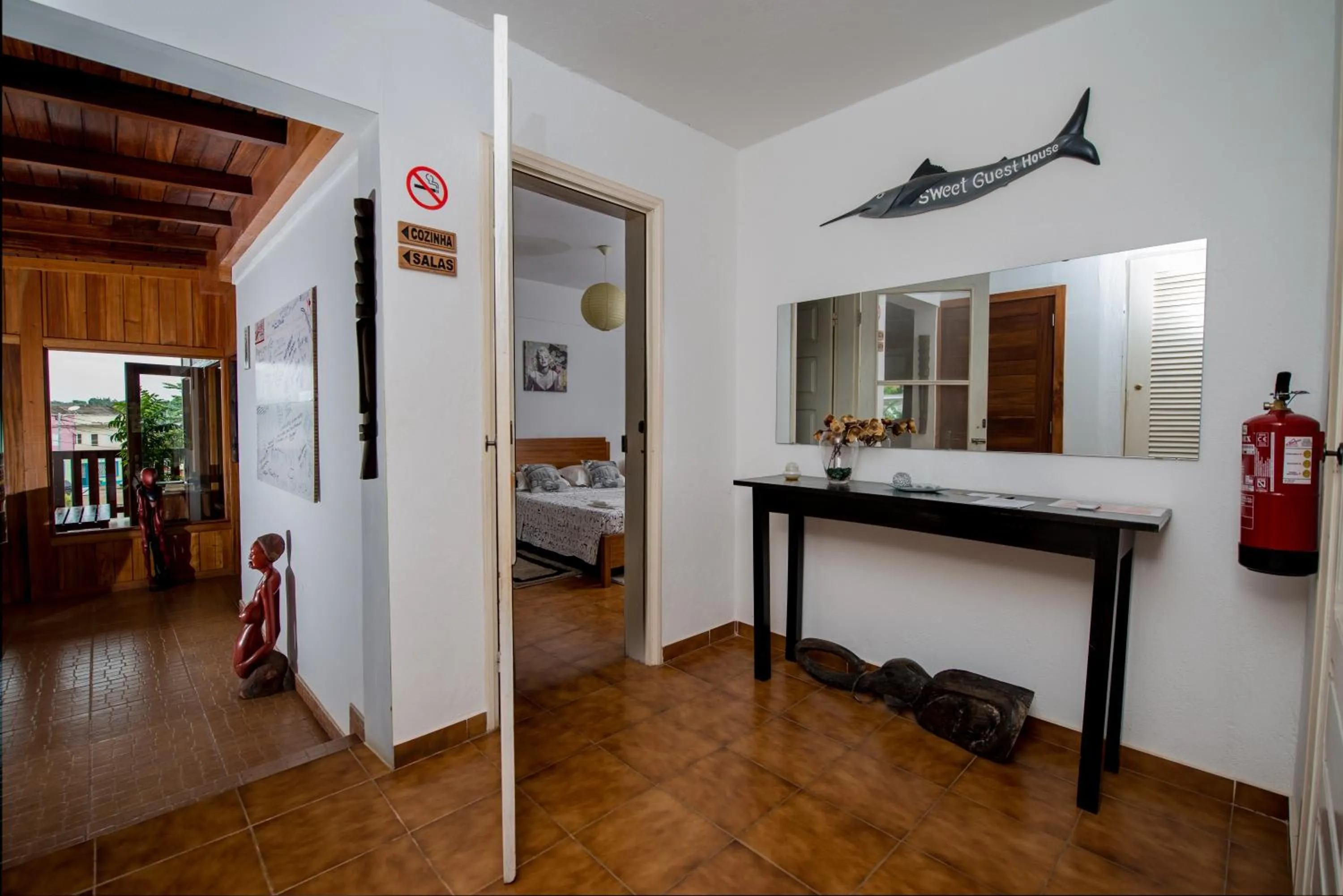 Communal lounge/ TV room in Sweet Guest House