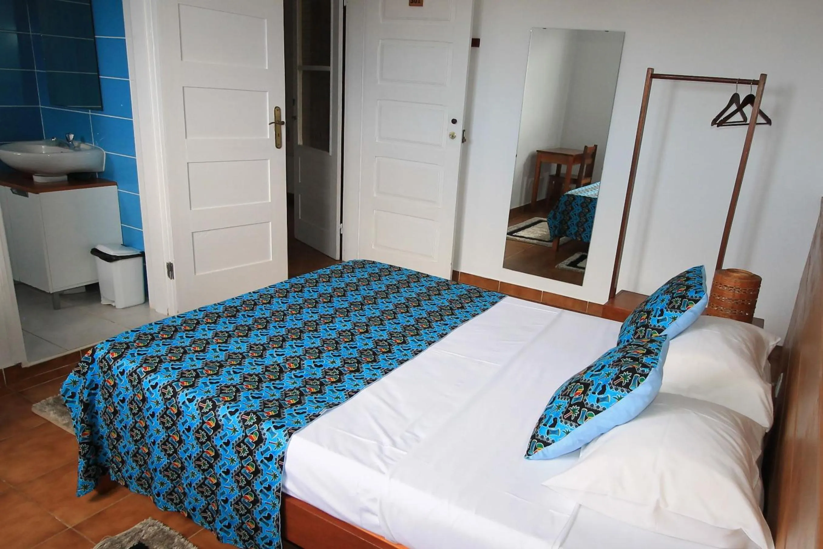 Bed in Sweet Guest House