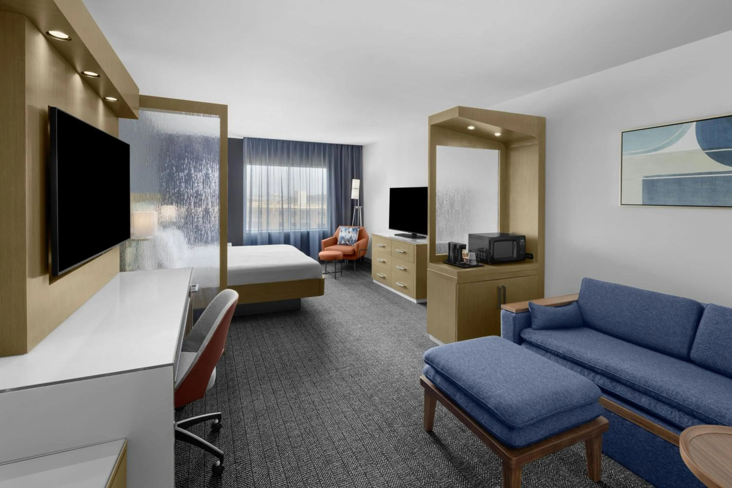 Living room, Bed in Courtyard by Marriott Orlando South/Grande Lakes Area