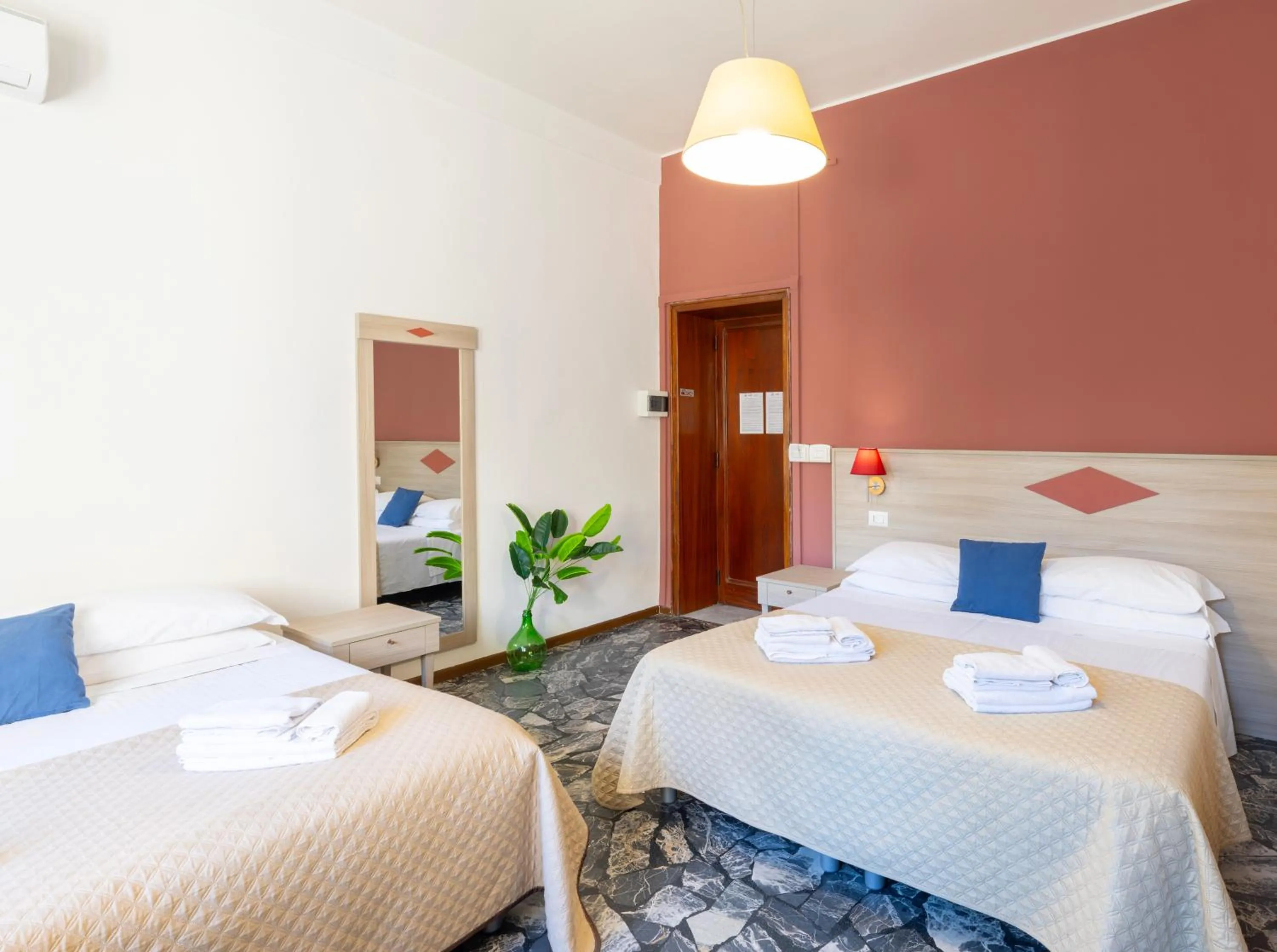 Bed in Kaliè Rooms Guest House