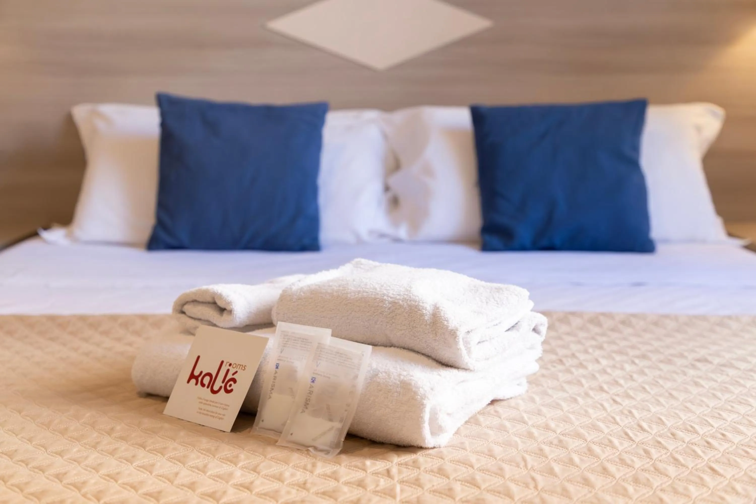 Bed in Kaliè Rooms Guest House