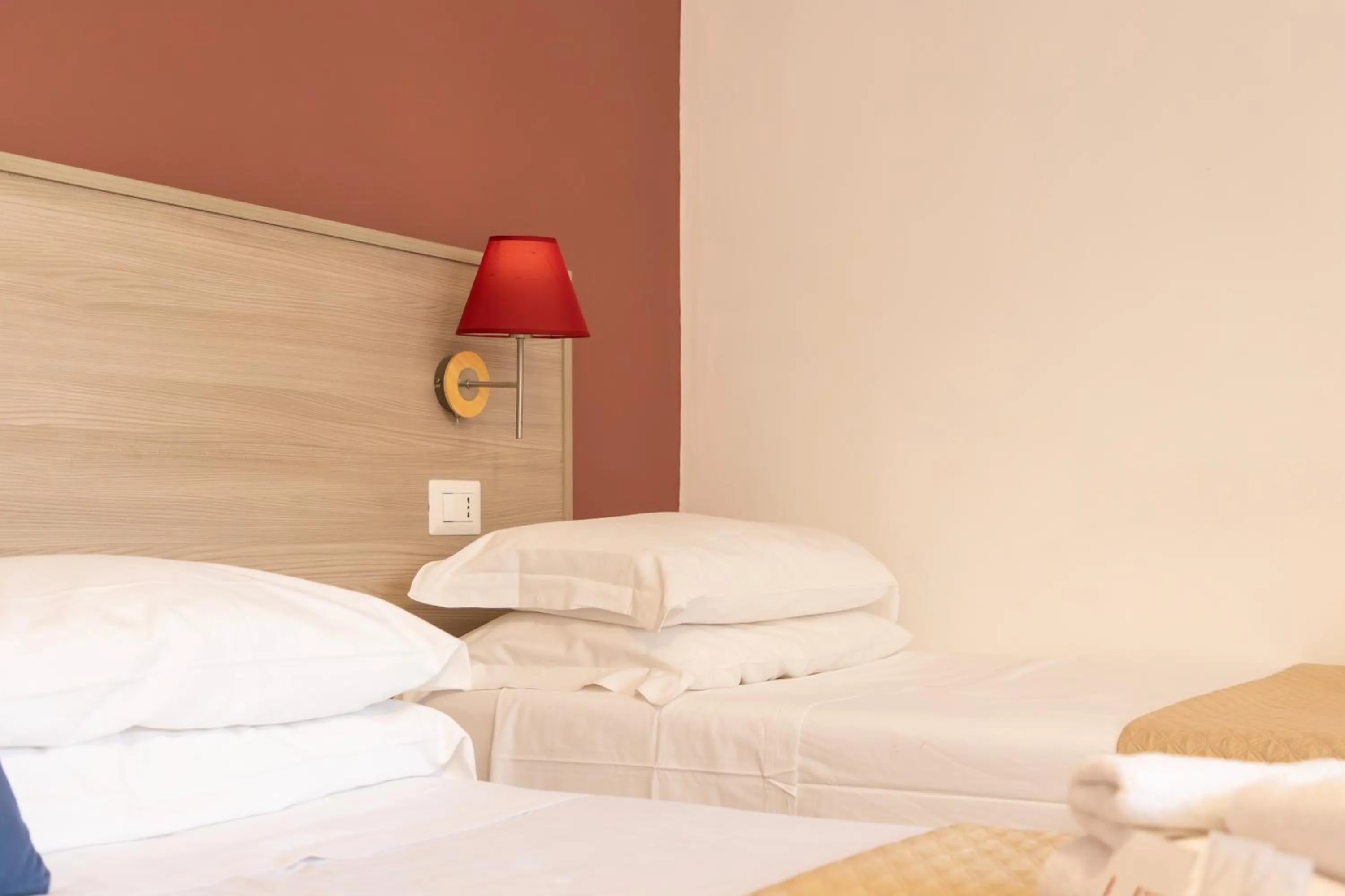 Bed in Kaliè Rooms Guest House