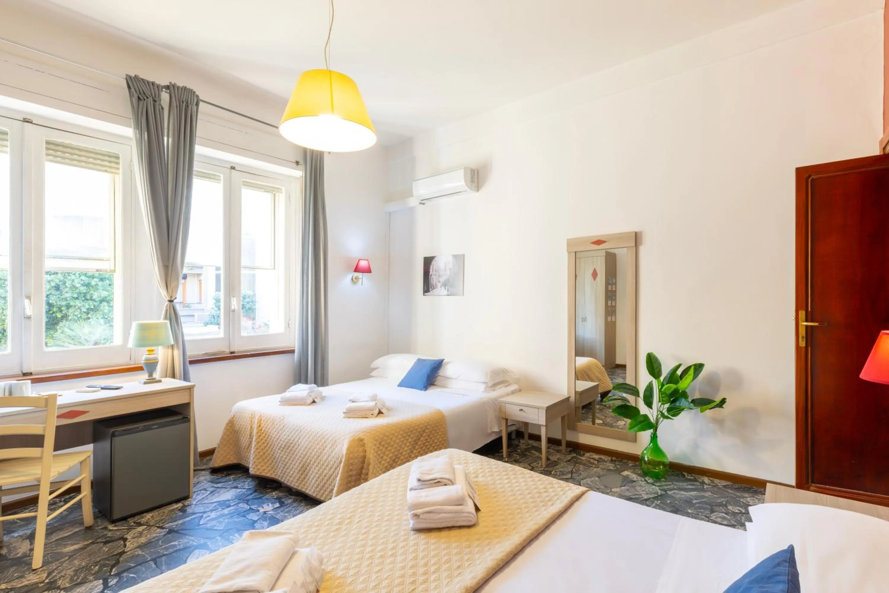 Bed in Kaliè Rooms Guest House