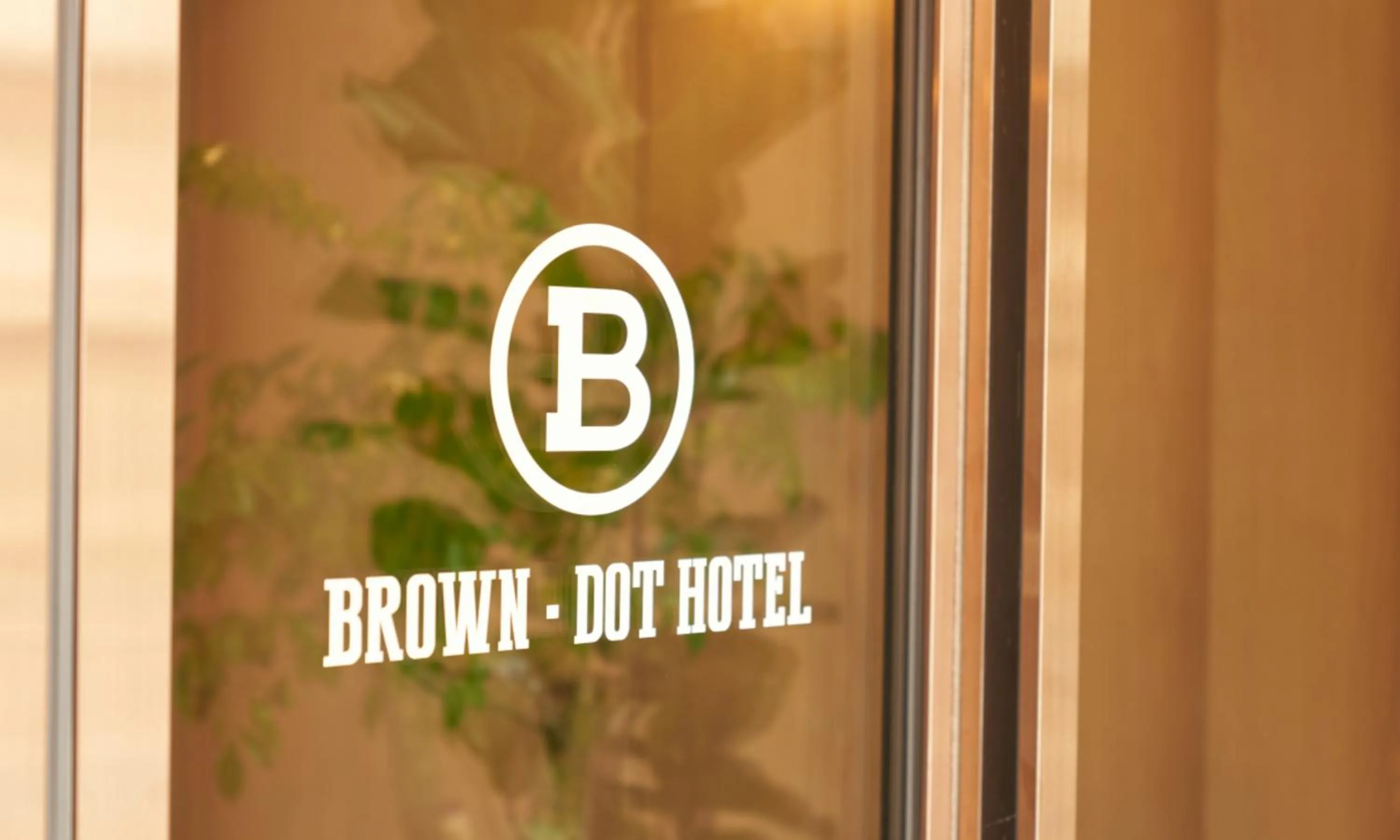 Property logo or sign in Brown Dot Hotel Gunsan Terminal Branch