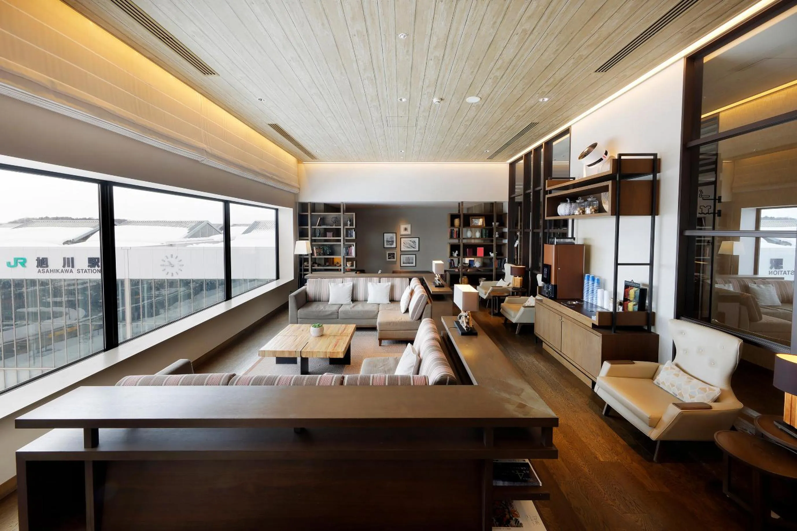 Communal lounge/ TV room in JR Inn Asahikawa