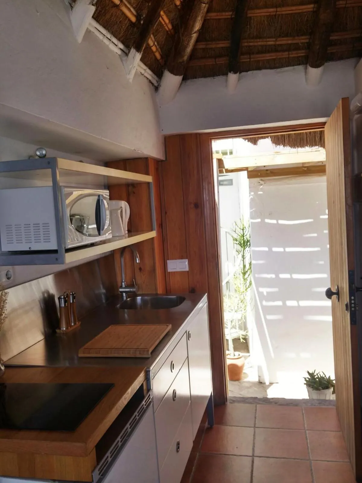 Kitchen or kitchenette in Bungalows Los Castillejos