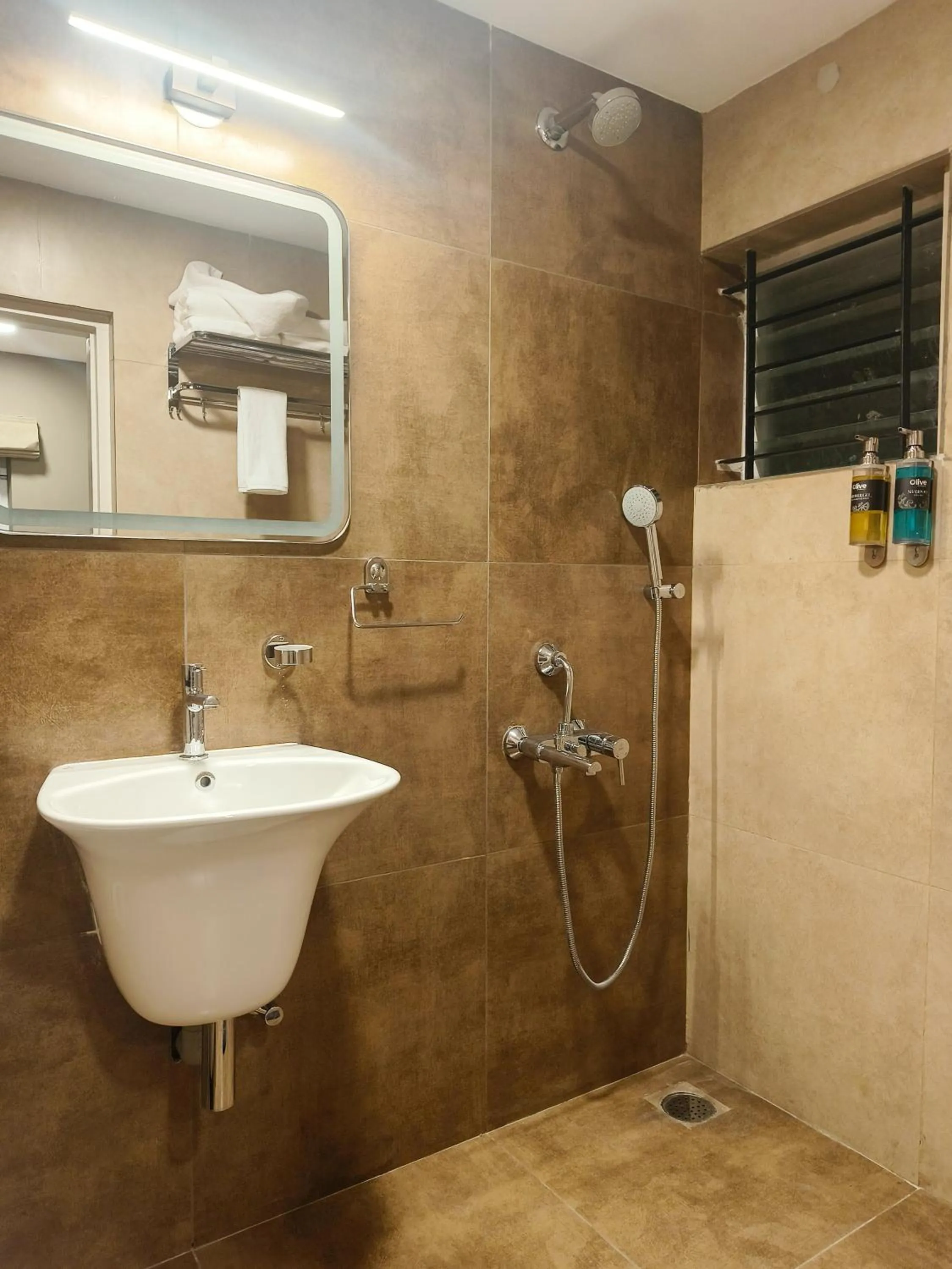 Shower in Olive Hotel Millers Road by Embassy Group