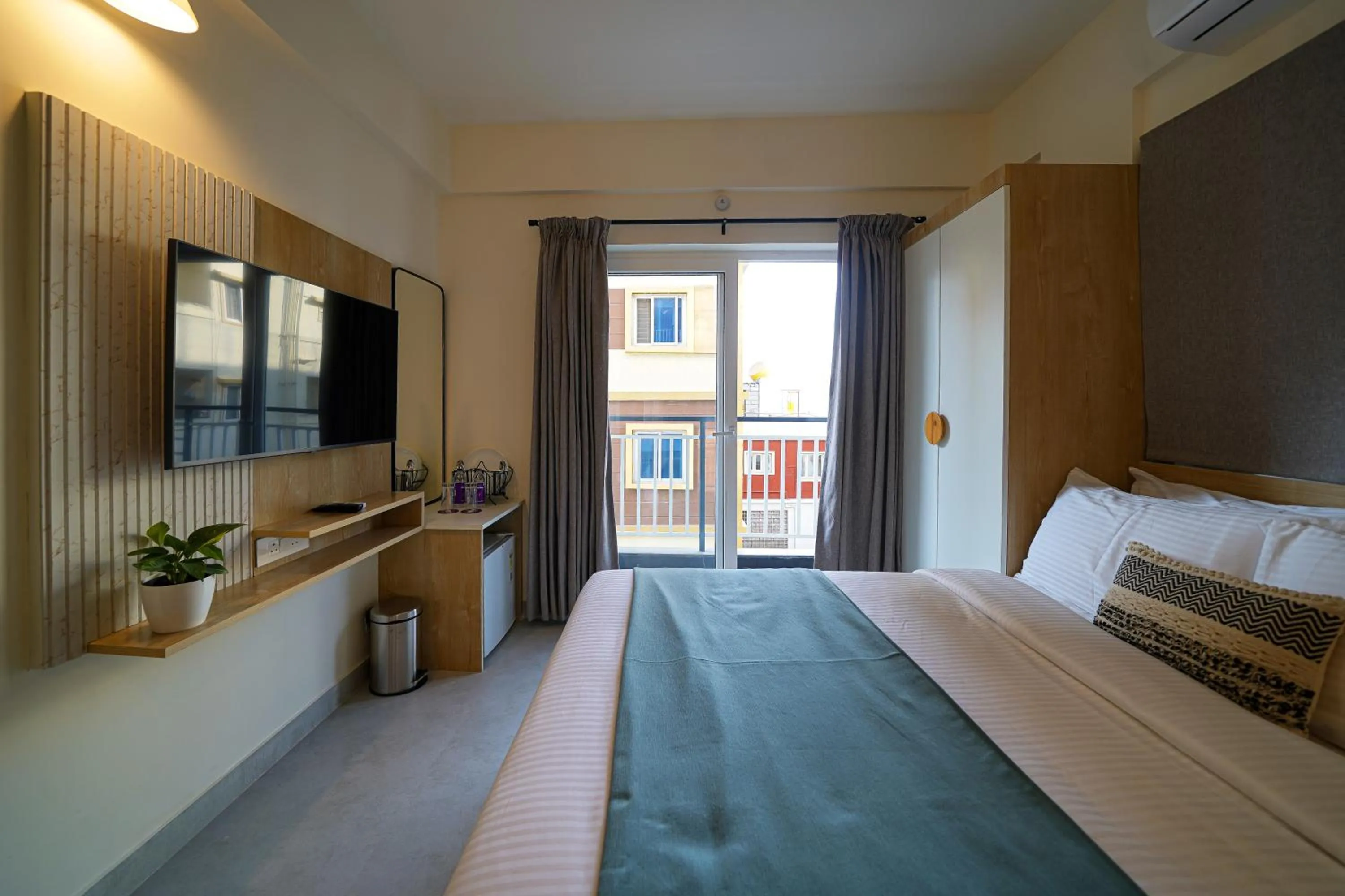 Bedroom, Bed in Olive Hotel Kundalahalli by Embassy Group