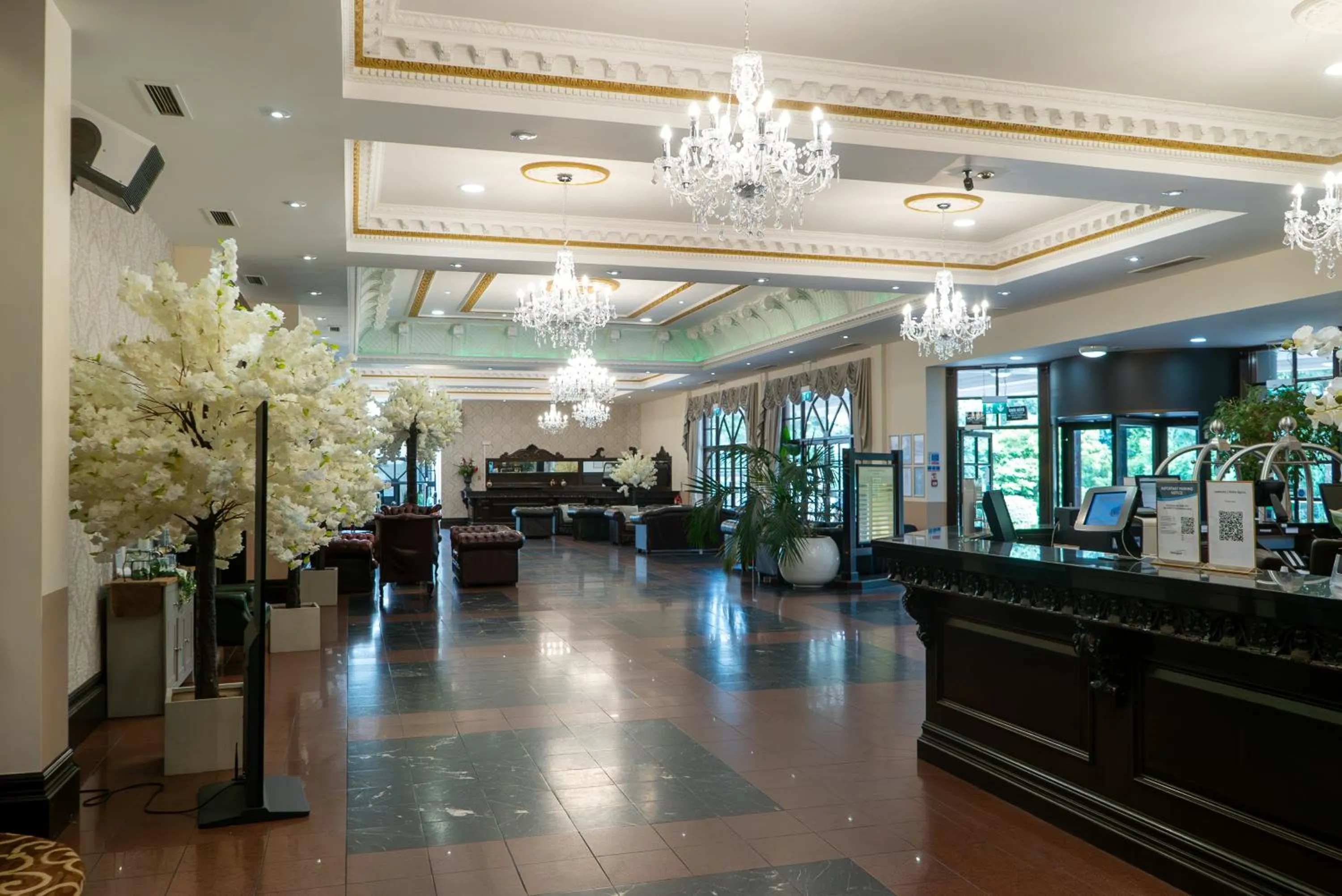 Lobby or reception in Royal Court Hotel