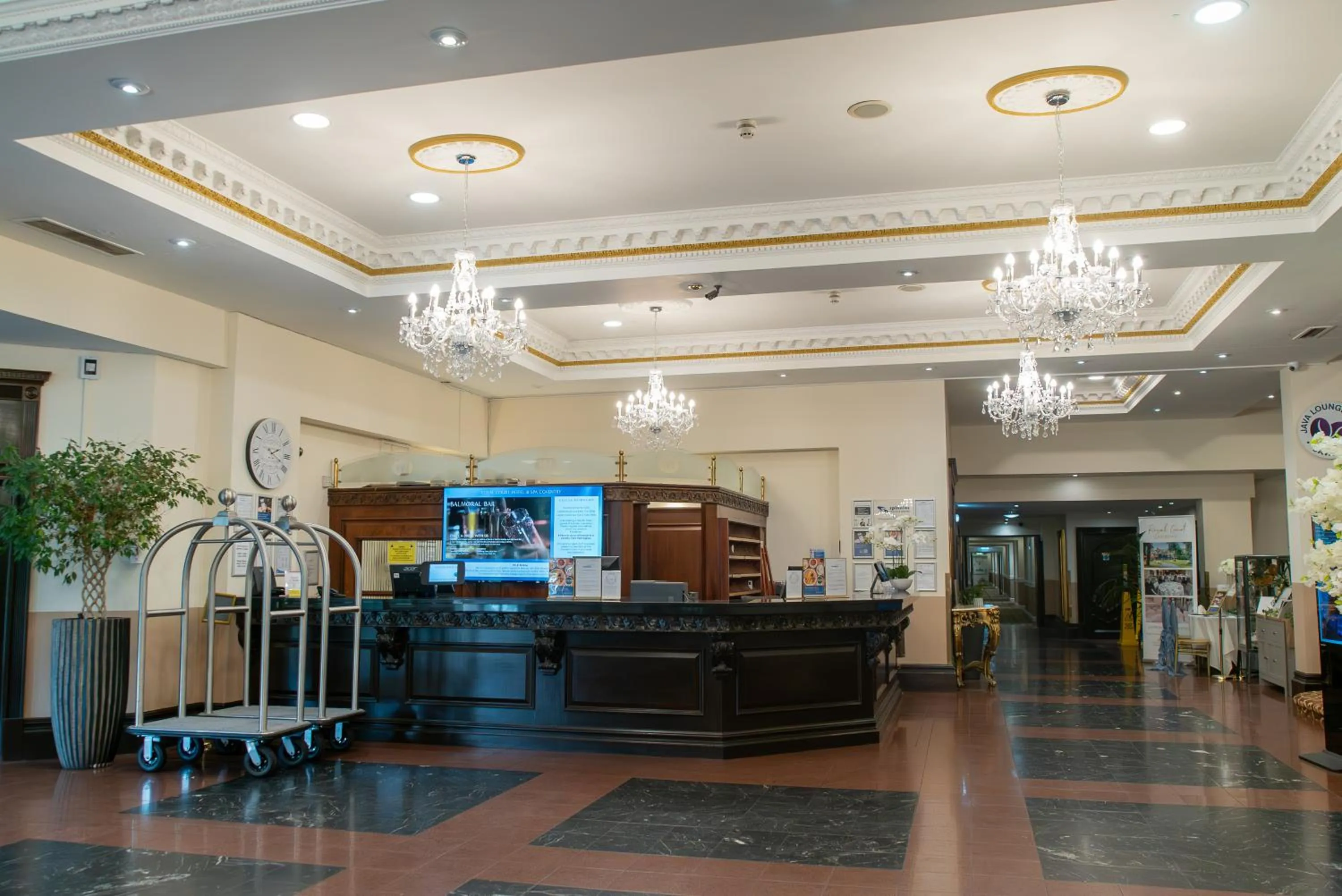 Lobby or reception in Royal Court Hotel