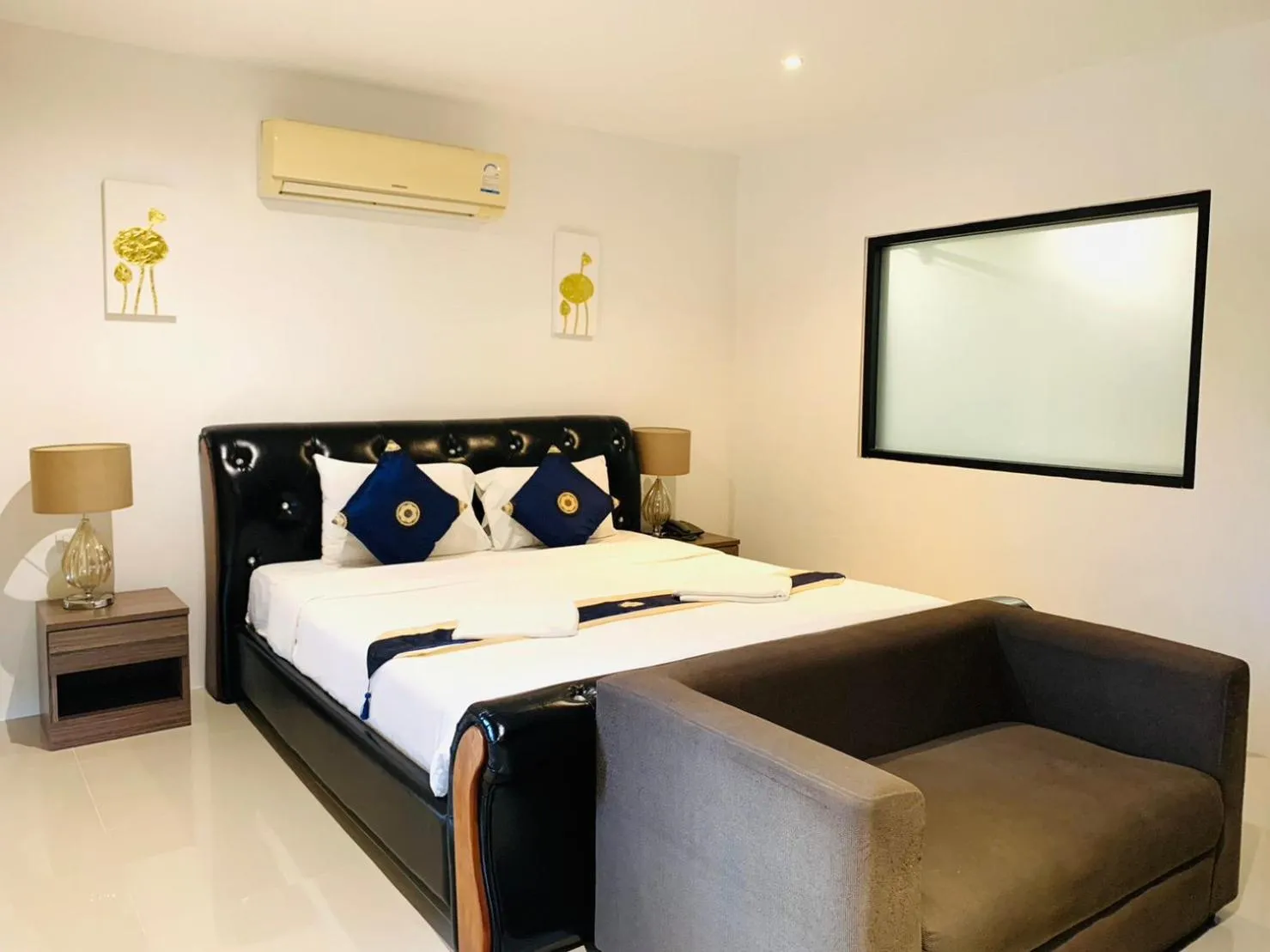 Bed in Ocean View Treasure Residence