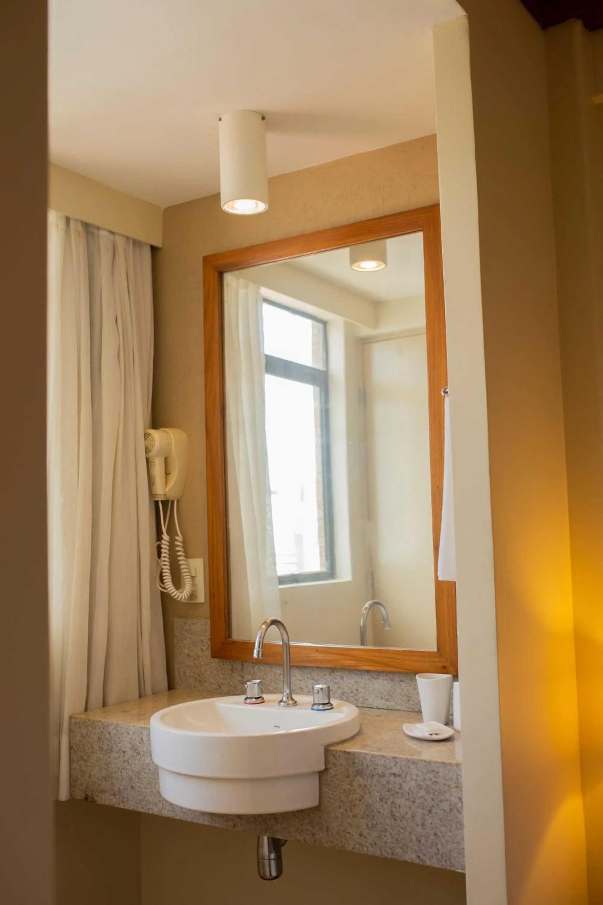 Bathroom in Magna Praia Hotel