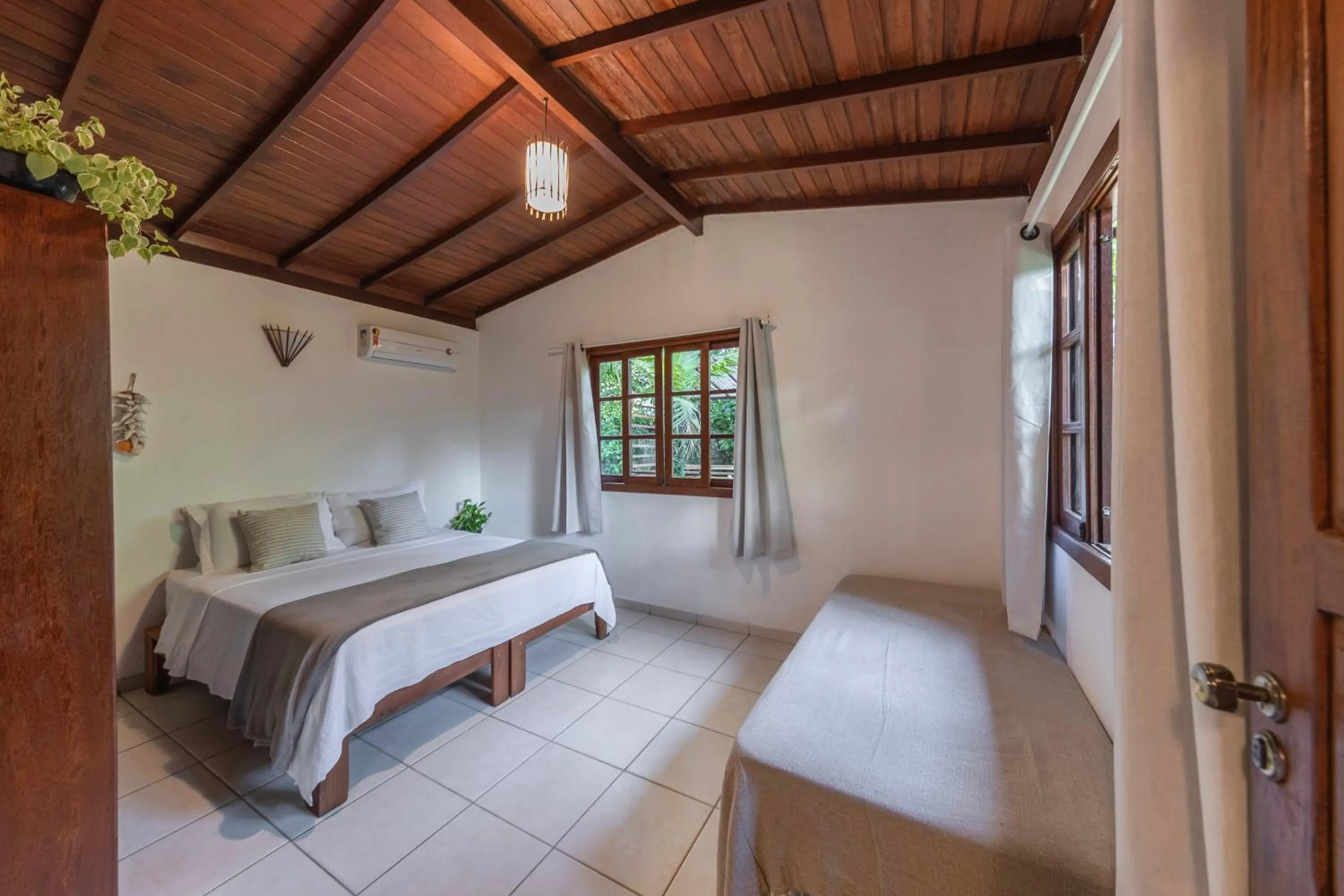 Bed in Pousada Arraial dos Sonhos