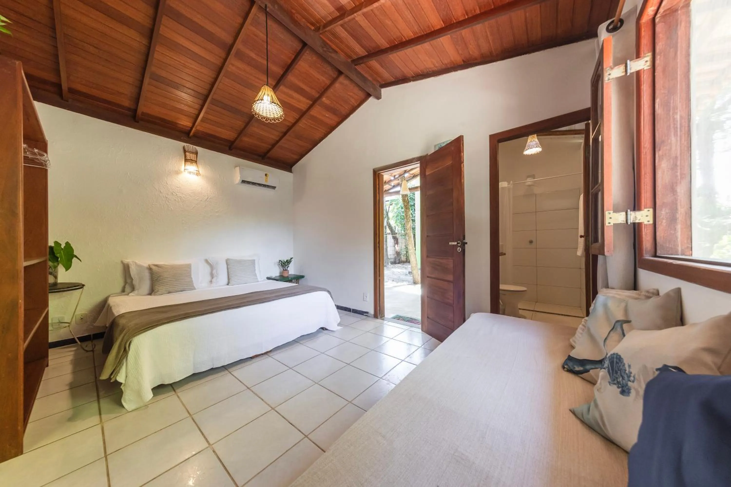 Bed in Pousada Arraial dos Sonhos