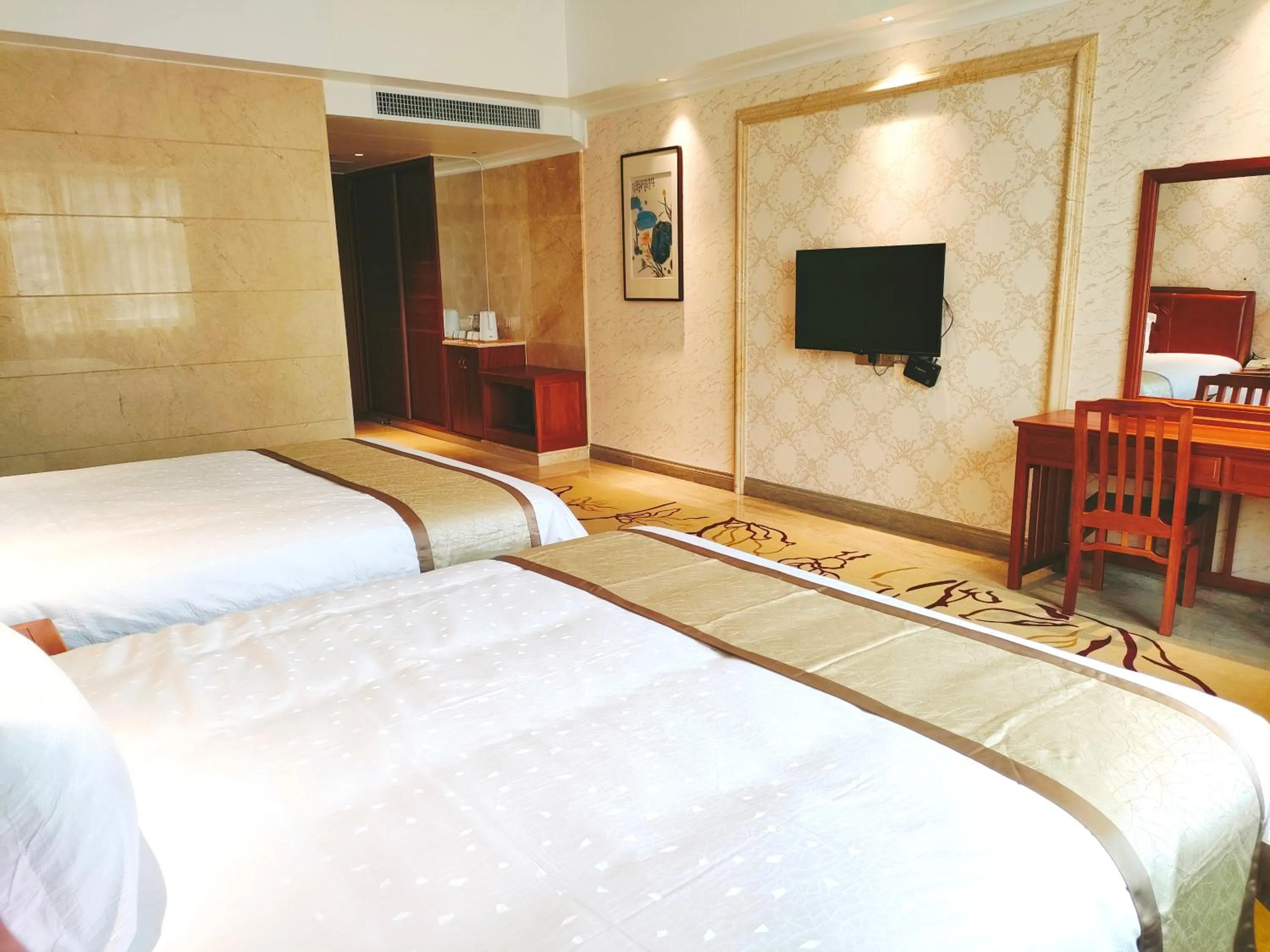 Bedroom in Mei Zhou Guset Hotel