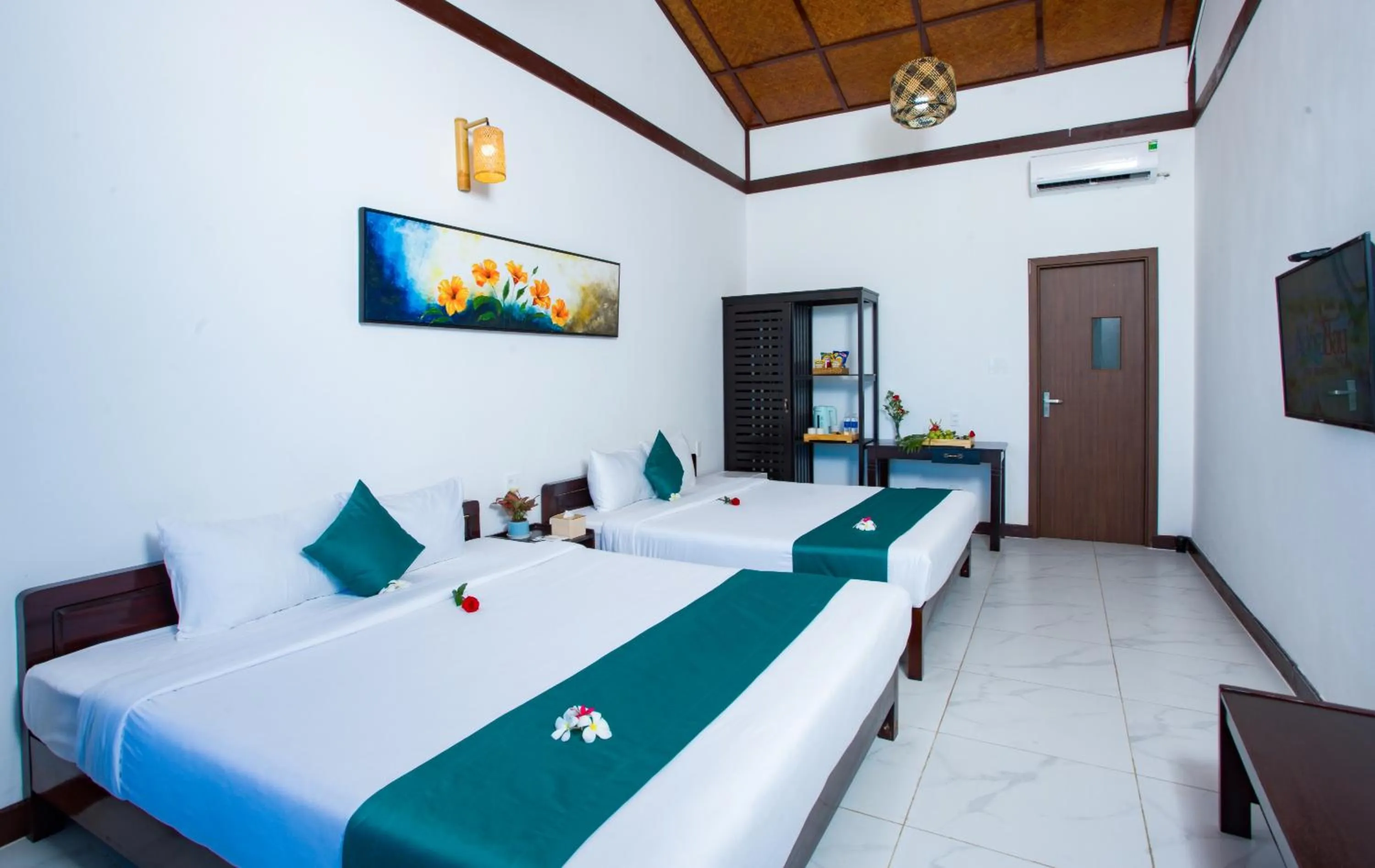 Bed in Adora Bay Ke Ga Beach Resort