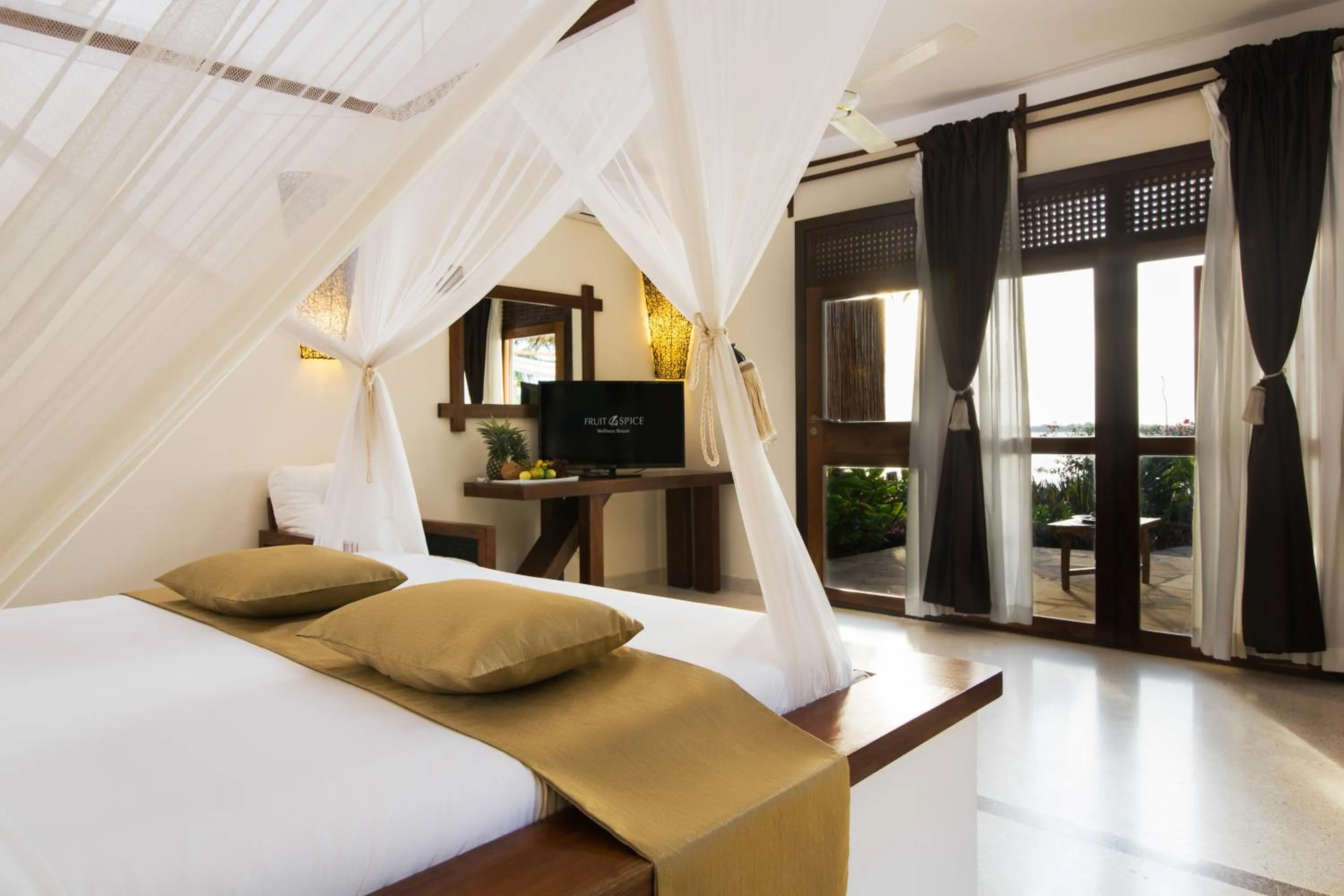 TV and multimedia, Bed in Fruit & Spice Wellness Resort Zanzibar