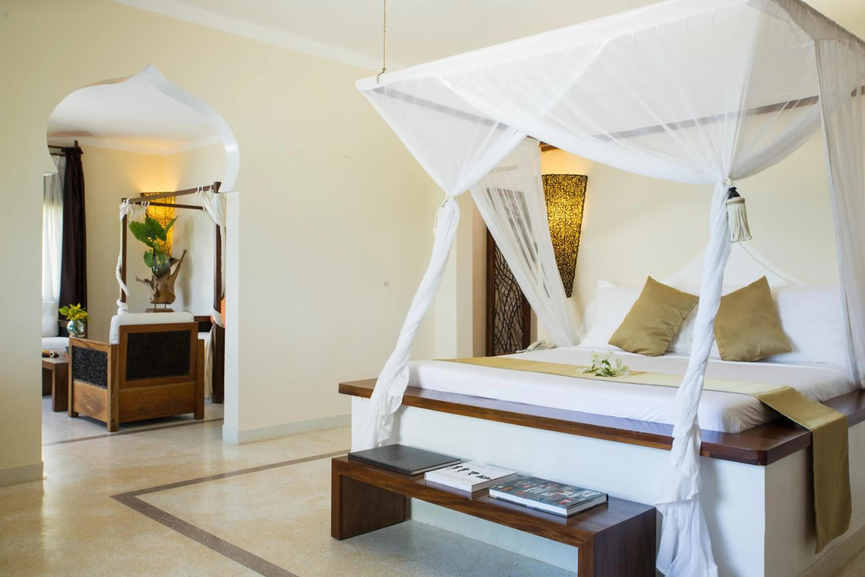 Living room, Bed in Fruit & Spice Wellness Resort Zanzibar