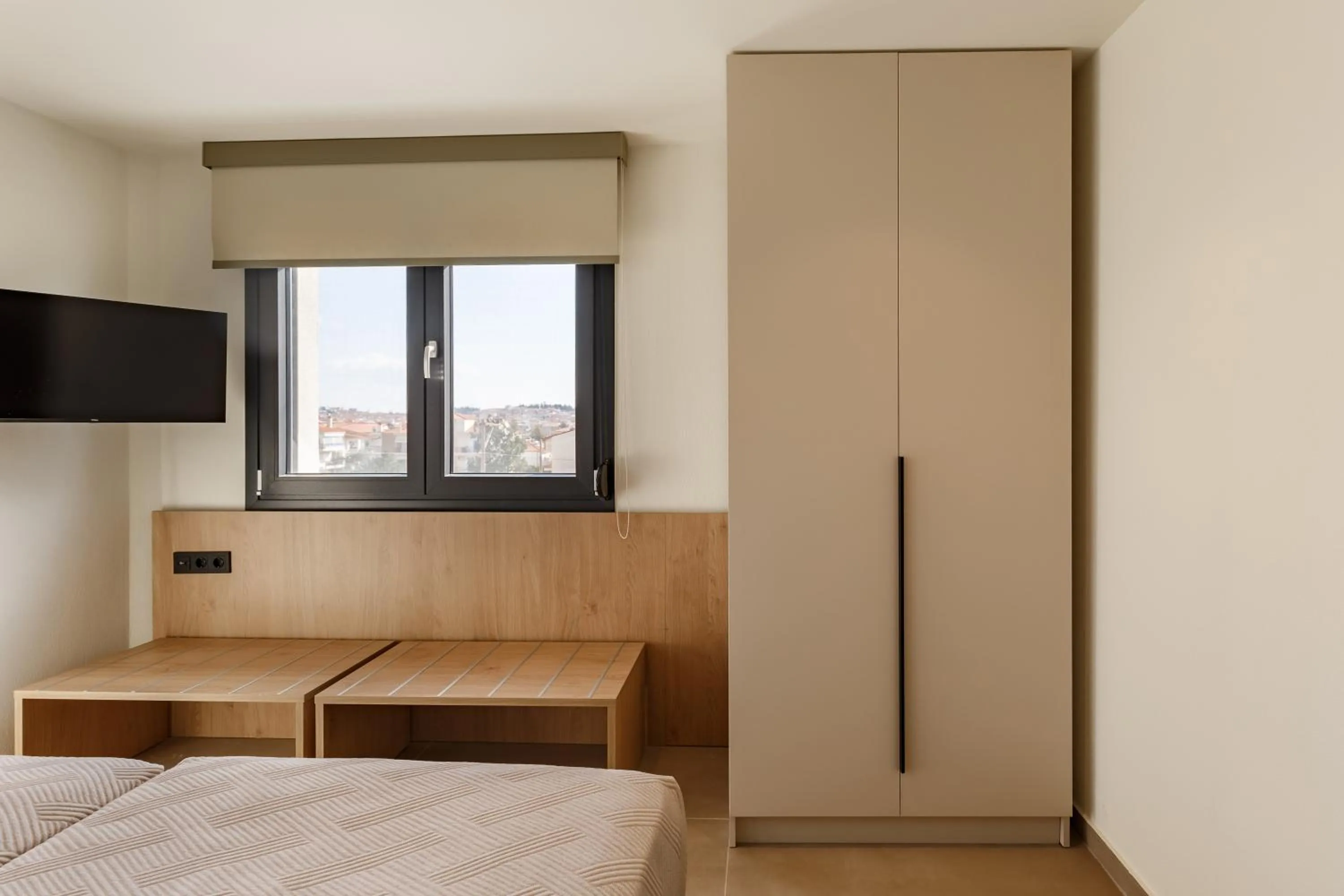 Bed in Dimi Residence