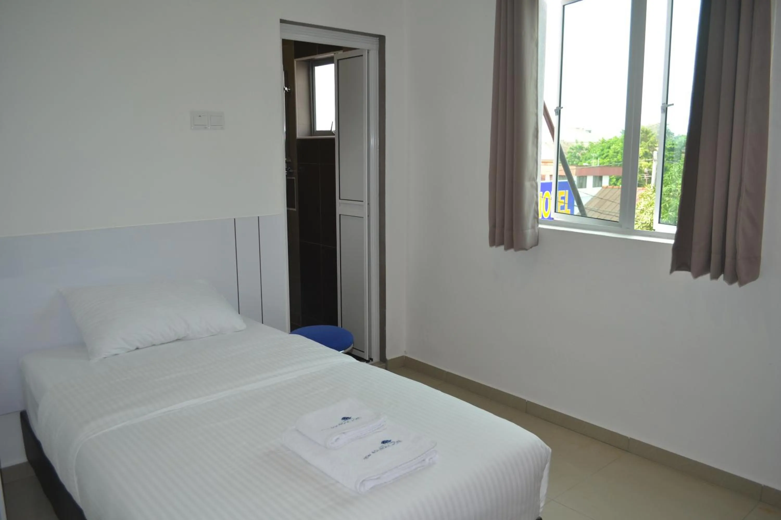 Bed in Yew Boutique Hotel