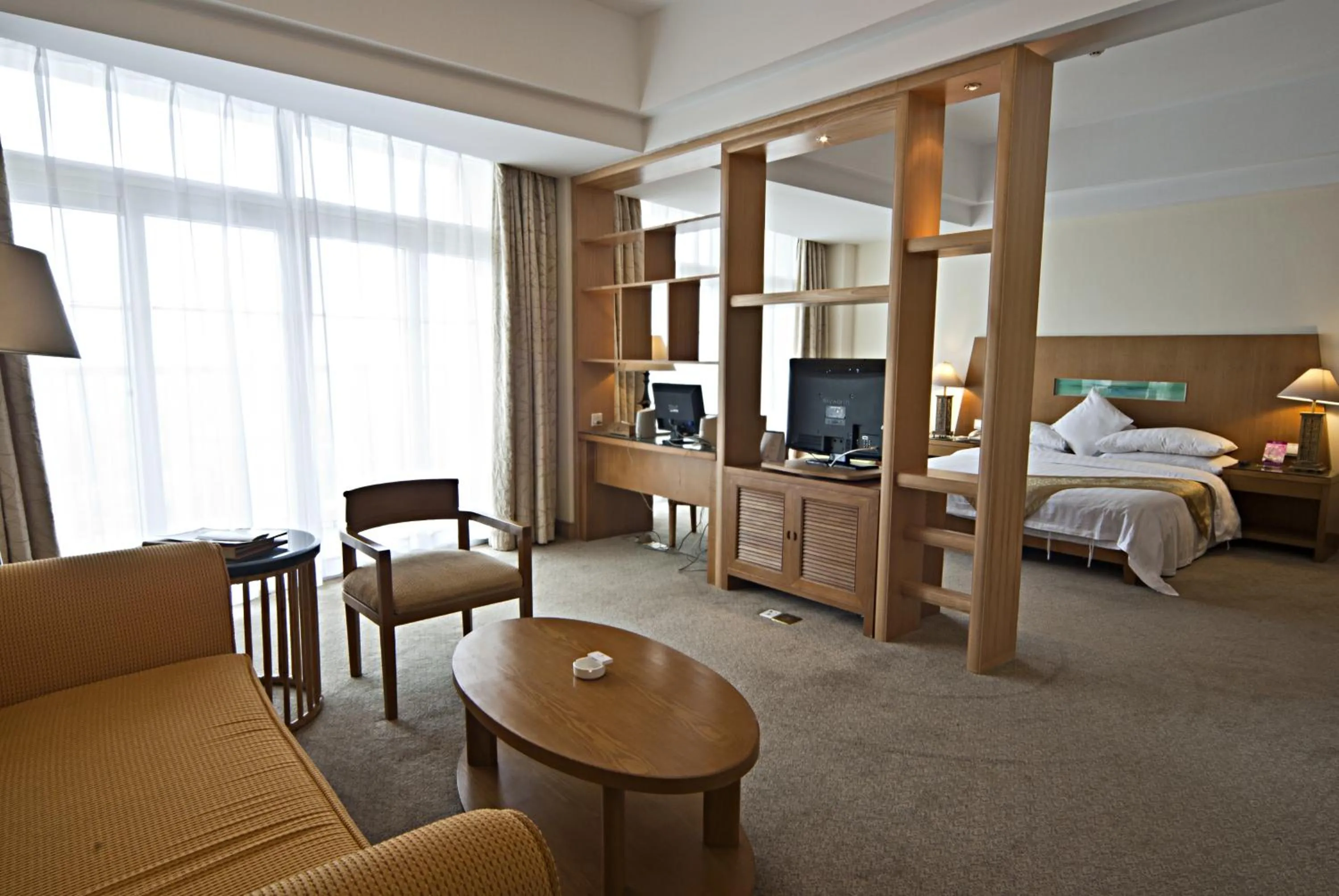 Living room, Bed in Wenchang Waika Hotel