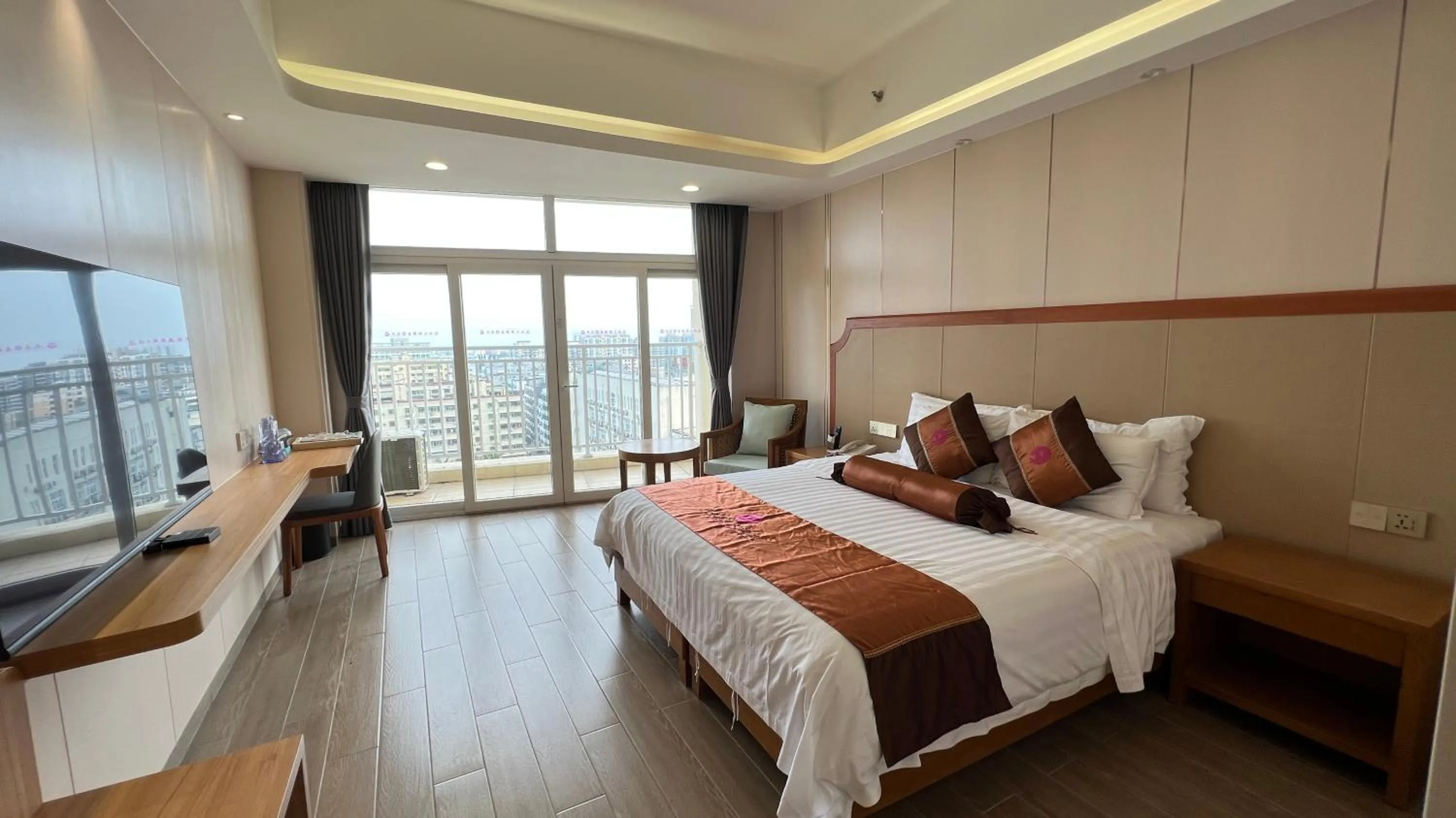 Living room, Bed in Wenchang Waika Hotel