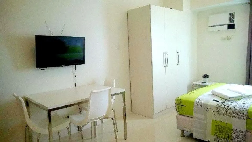 Bed in Condo Studio Luxe in Princeton Residences